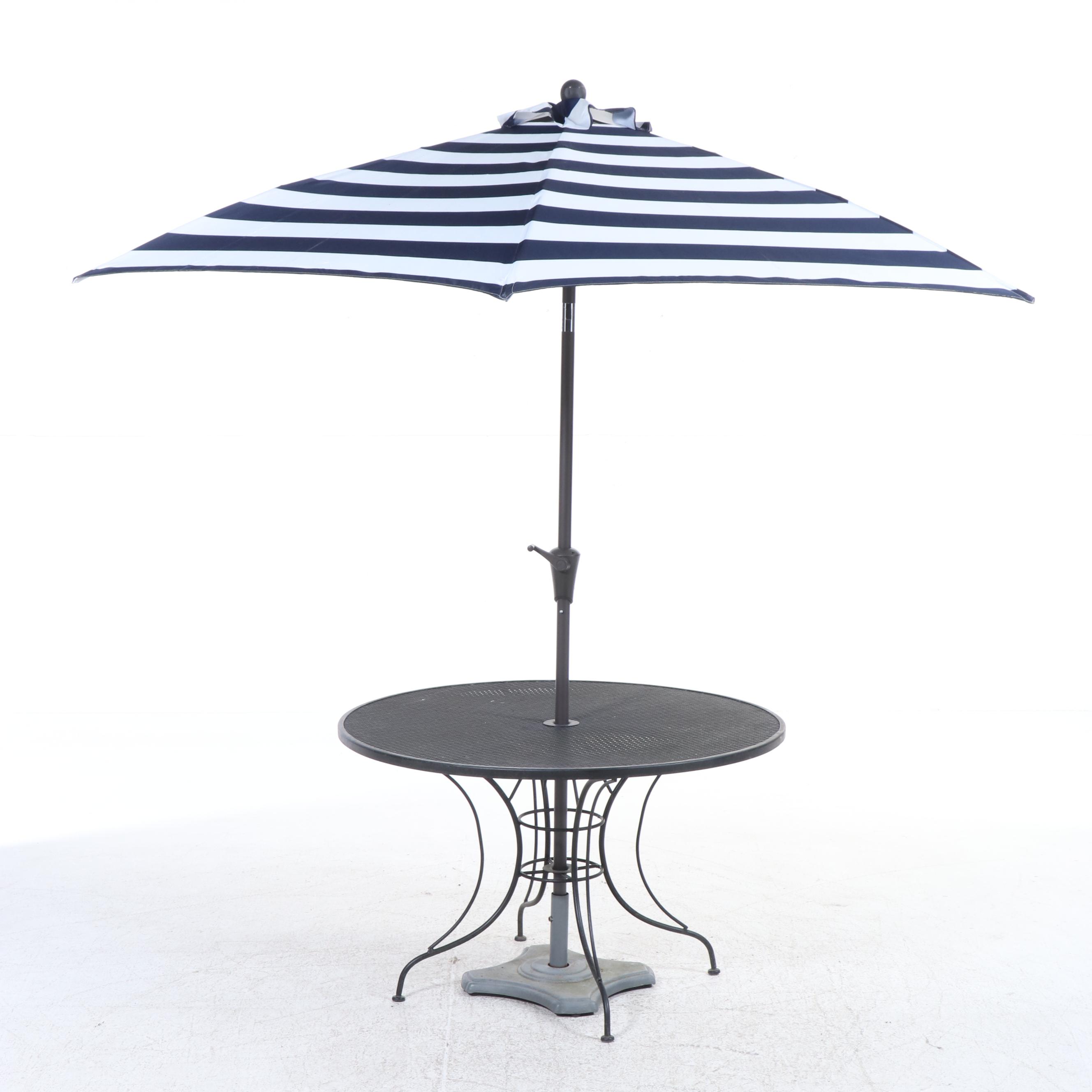 Five-Piece Wrought Iron Patio Dining Set with Umbrella and Stand