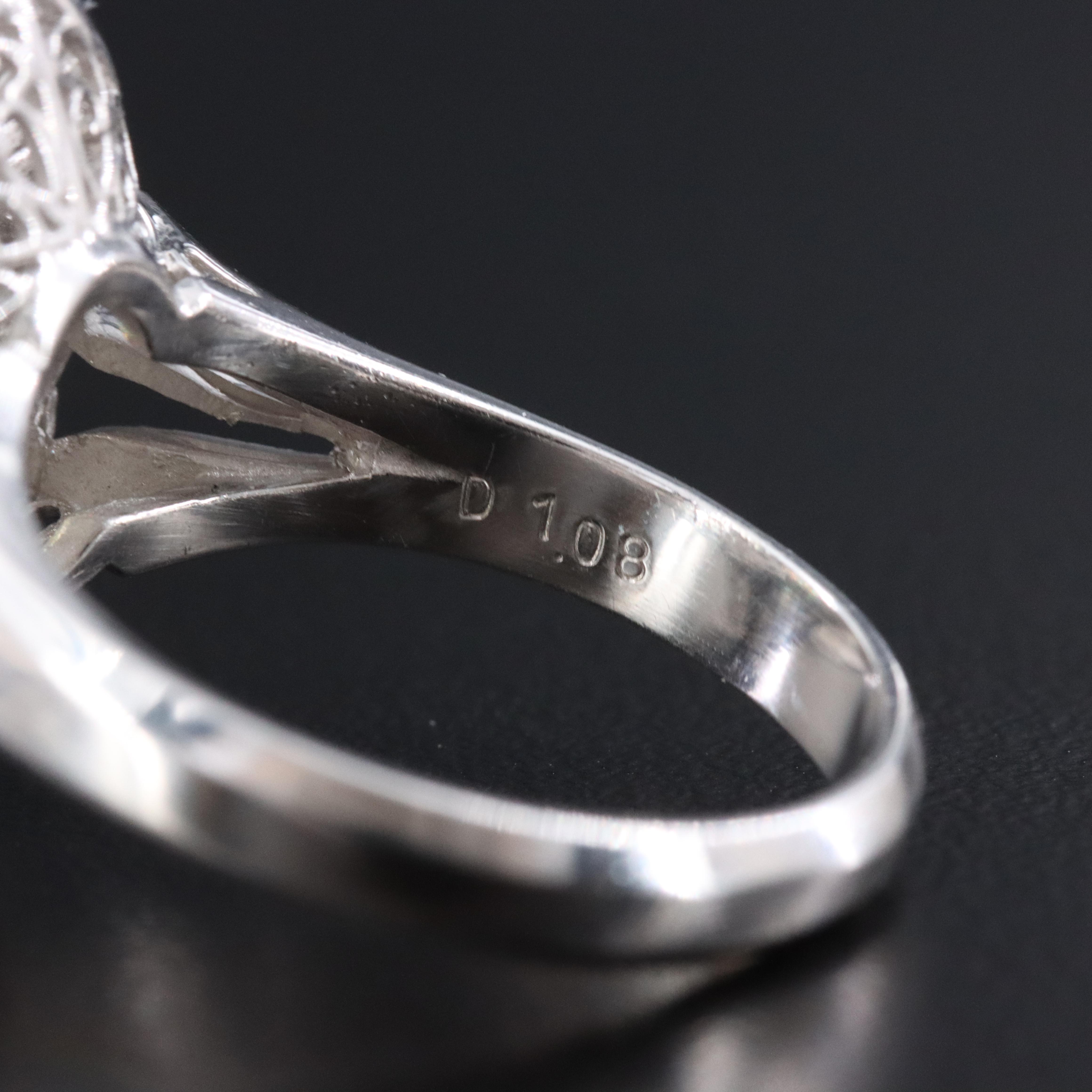 Platinum 1.29 CT Alexandrite and 1.08 CTW Diamond Halo Ring