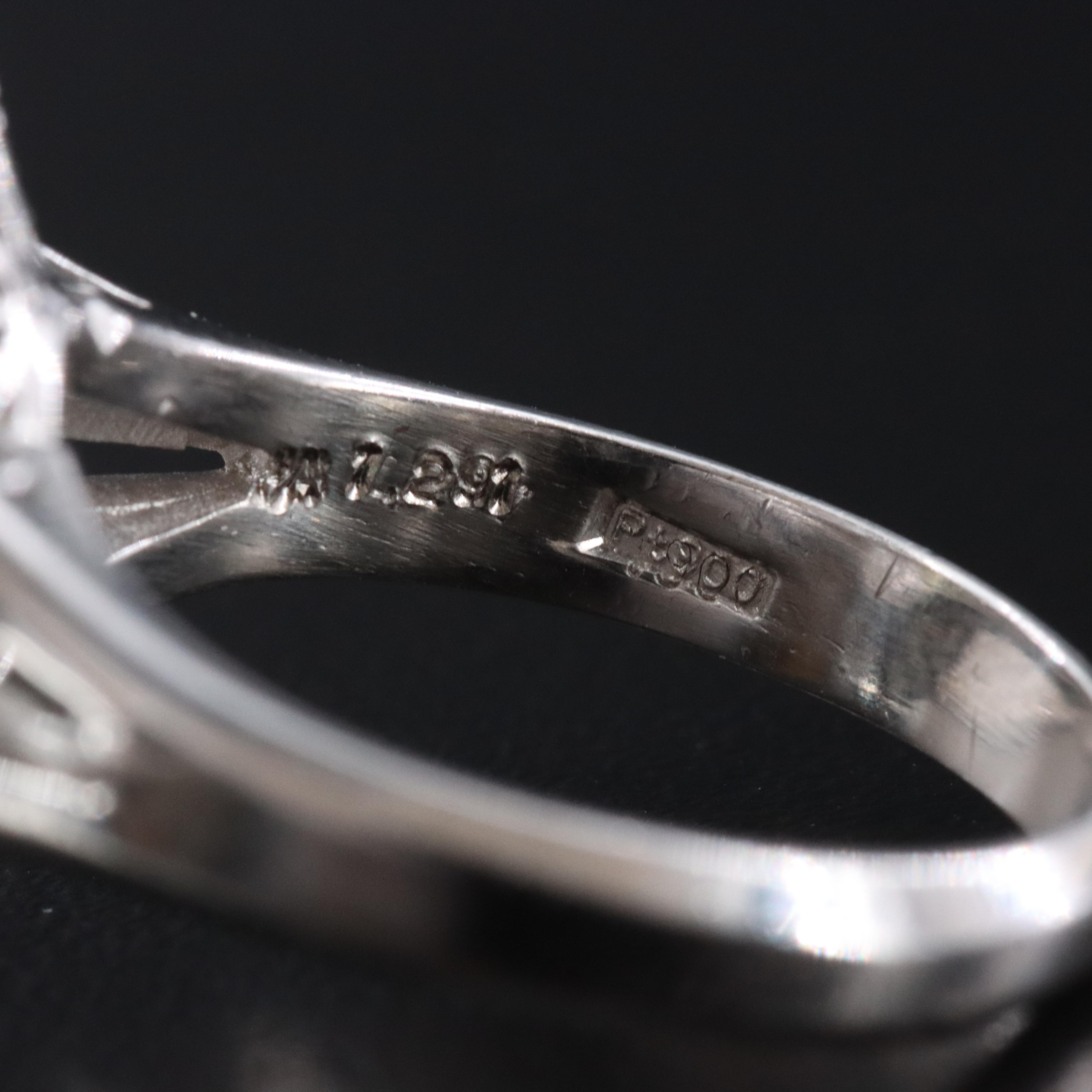 Platinum 1.29 CT Alexandrite and 1.08 CTW Diamond Halo Ring