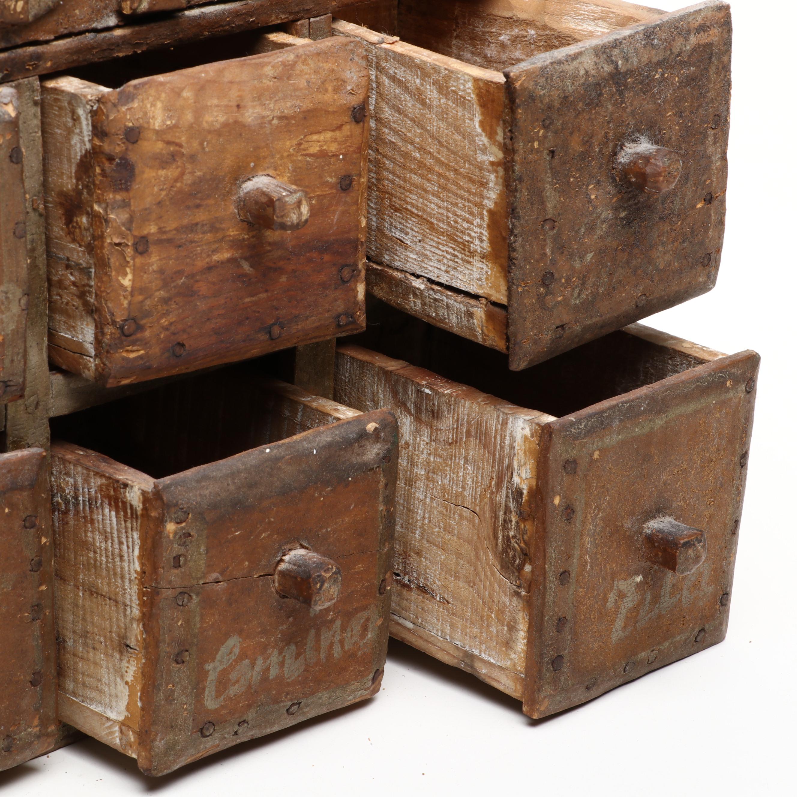 Mexican Folk Art Carved Wood Eight Drawer Spice Cabinet, 19th Century
