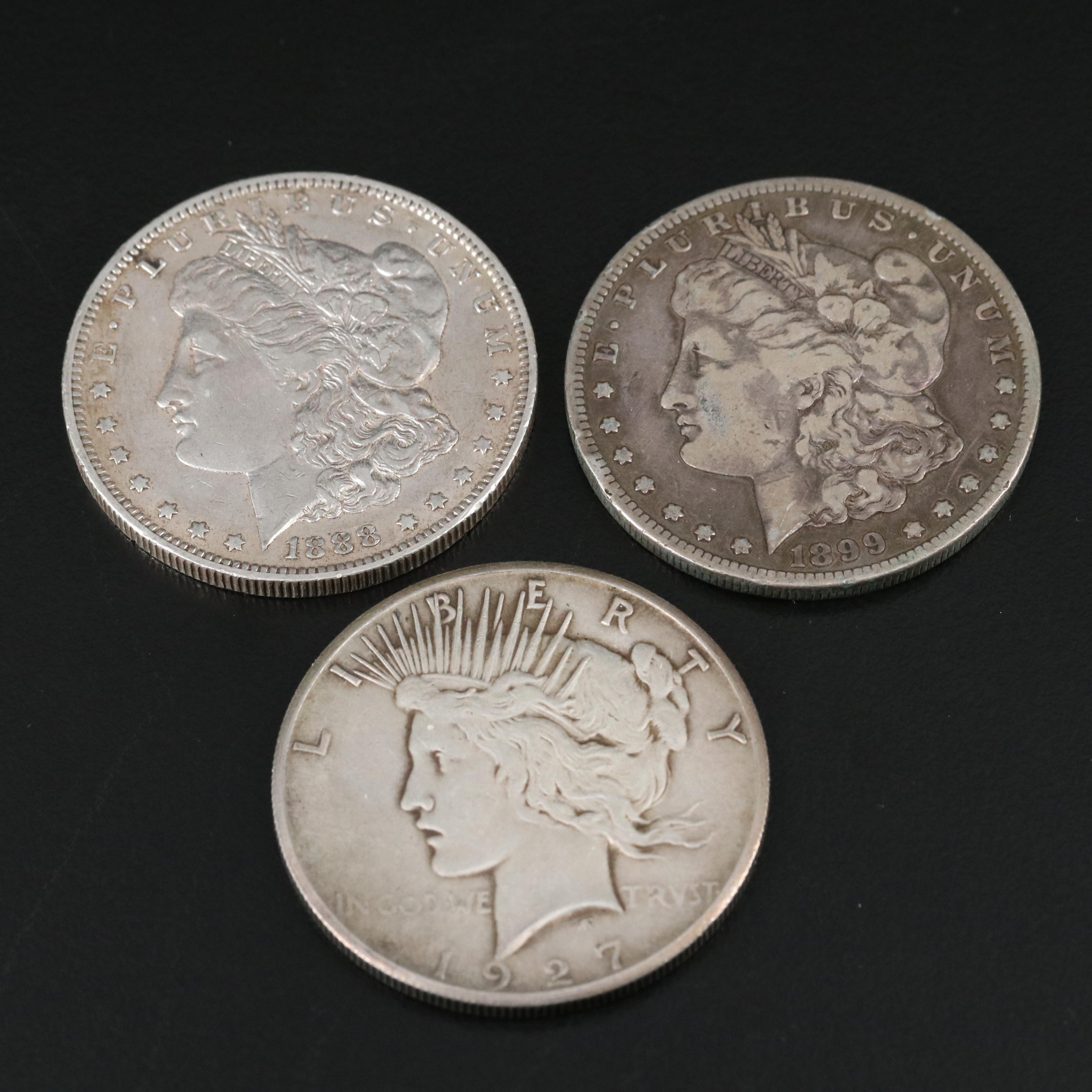 Two Morgan Dollars 1888-O, 1899-S, and a 1927 Peace Dollar