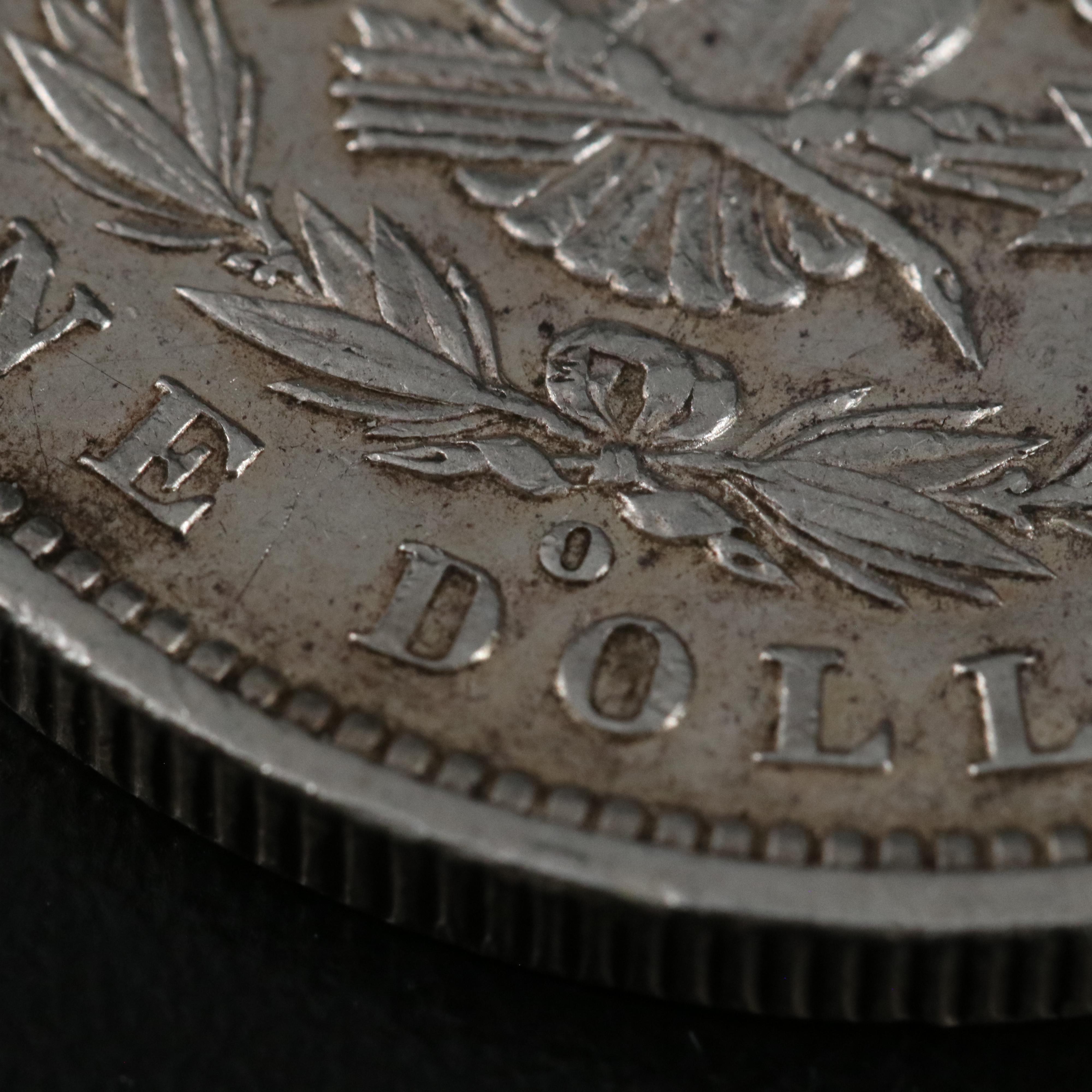 Two Morgan Dollars 1888-O, 1899-S, and a 1927 Peace Dollar