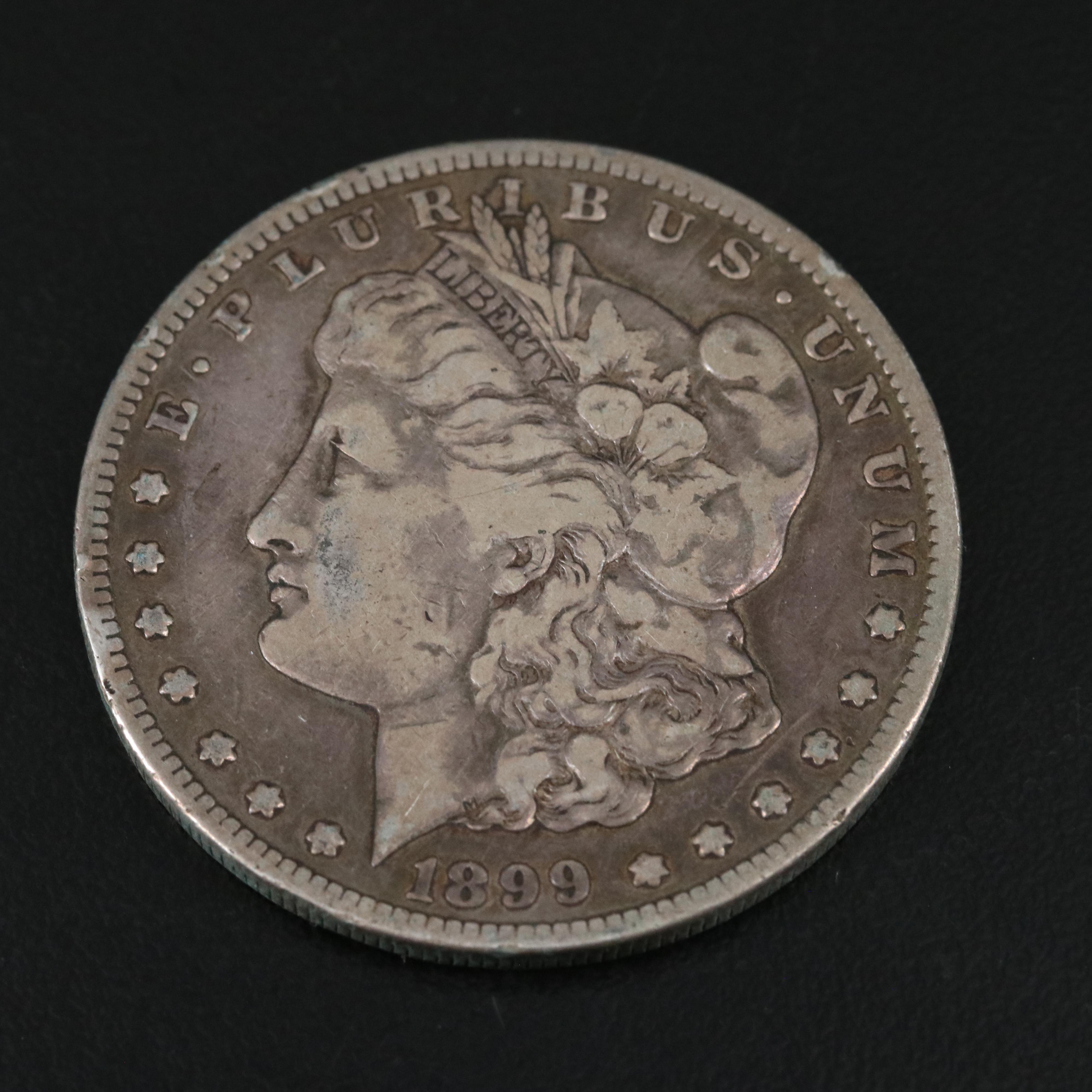 Two Morgan Dollars 1888-O, 1899-S, and a 1927 Peace Dollar