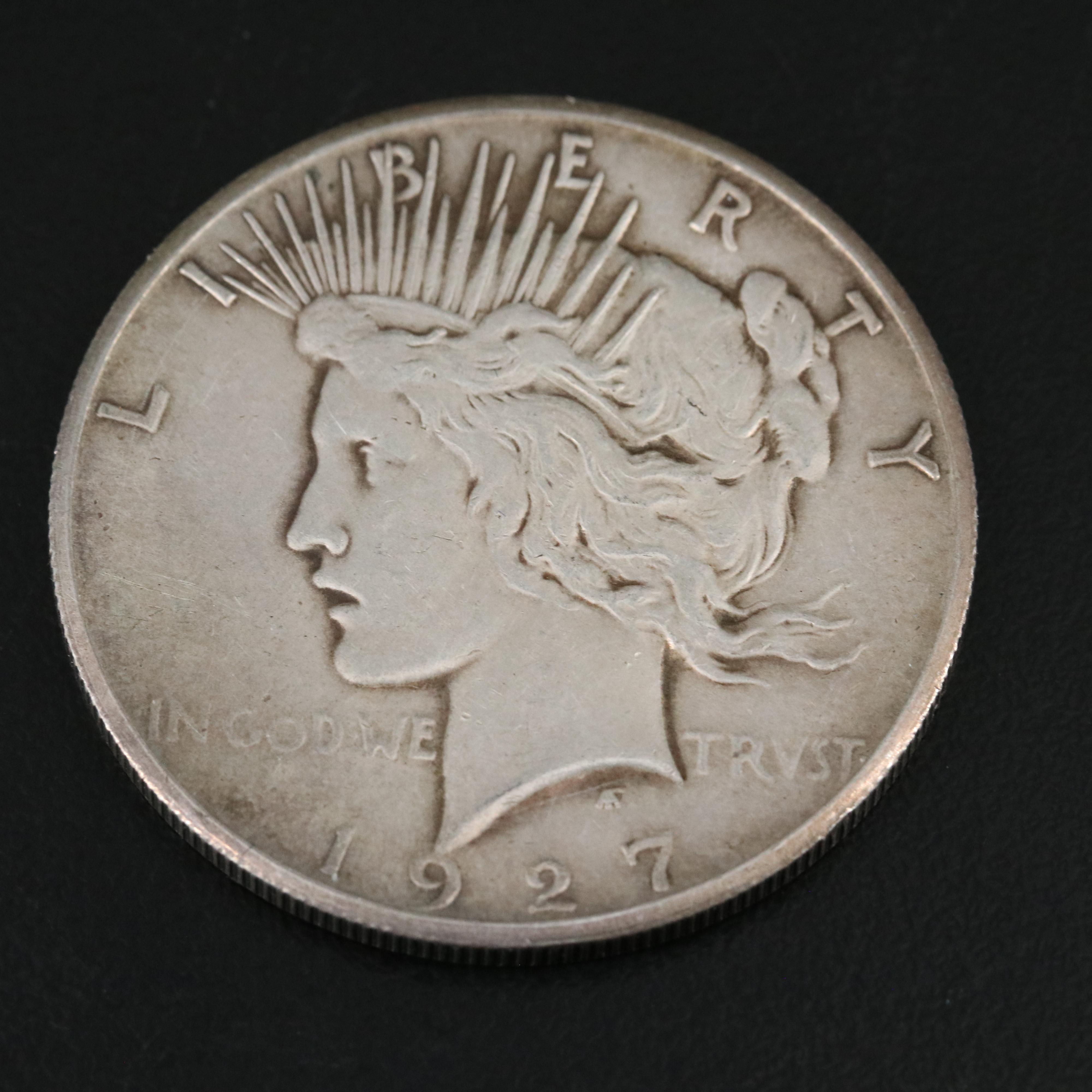Two Morgan Dollars 1888-O, 1899-S, and a 1927 Peace Dollar