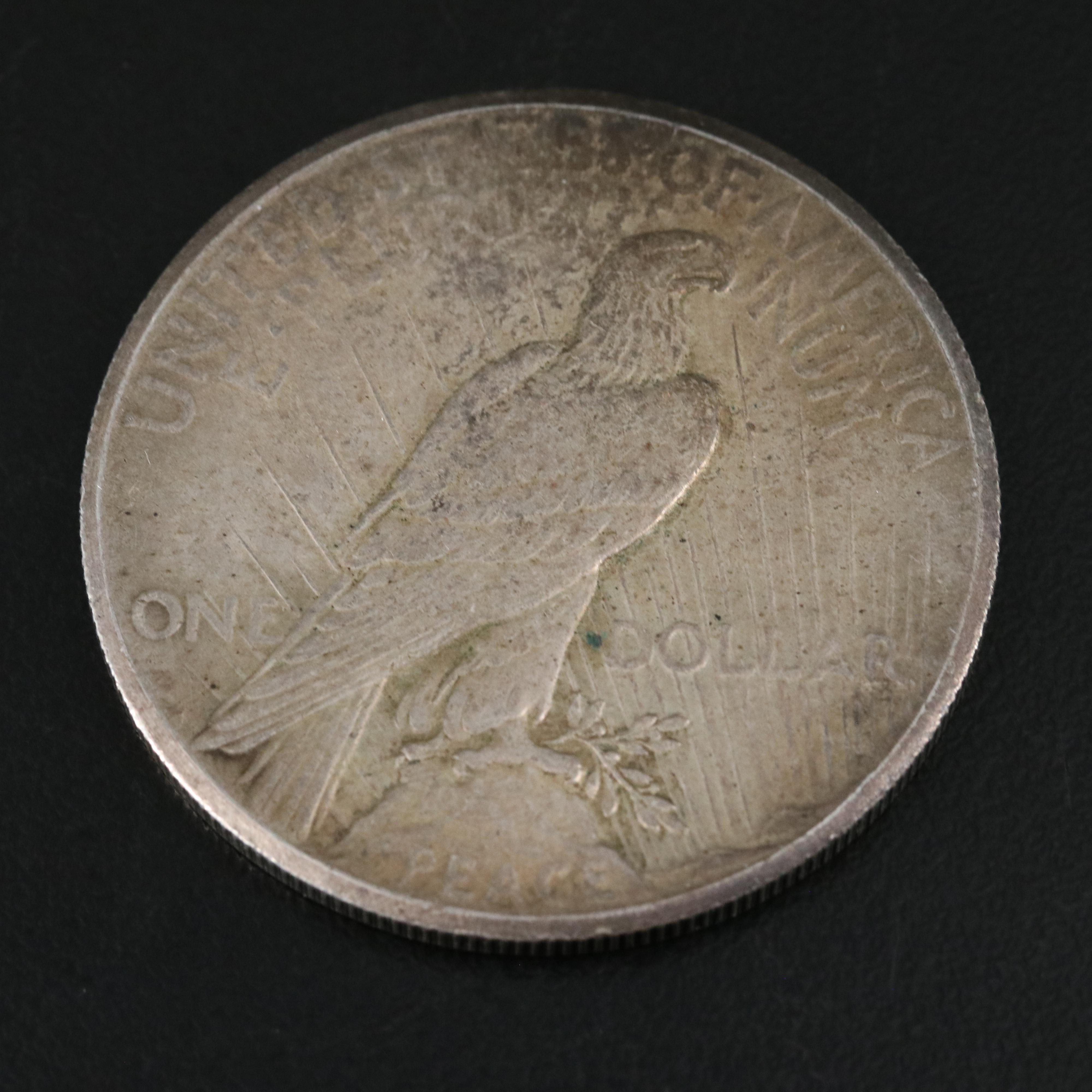 Two Morgan Dollars 1888-O, 1899-S, and a 1927 Peace Dollar