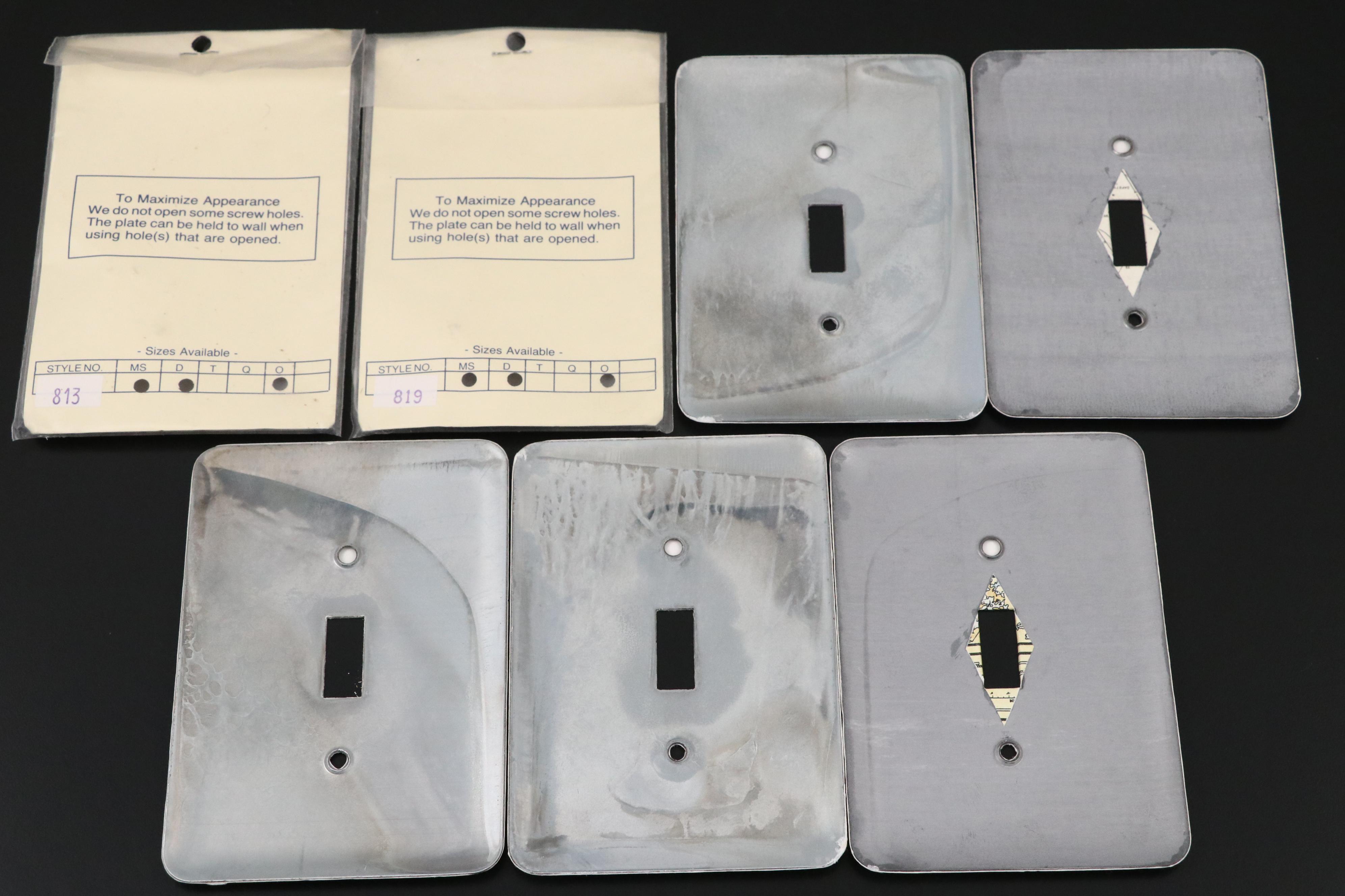 Delft Canal Scene Tile with Other Metal Lighthouse-Themed Switch Plates