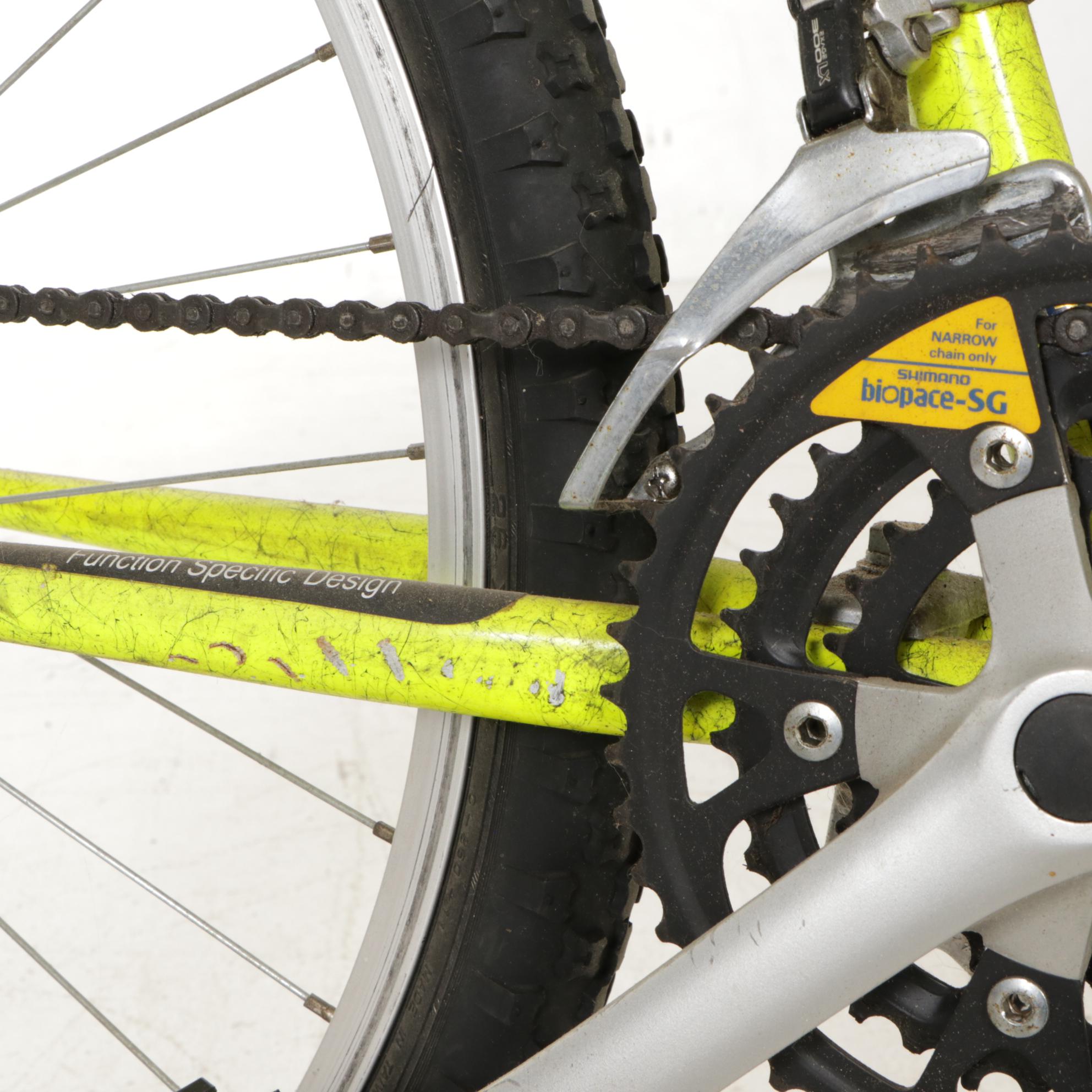 Neon Yellow Trek 830 Mountain Bike with Green Avenir Bag
