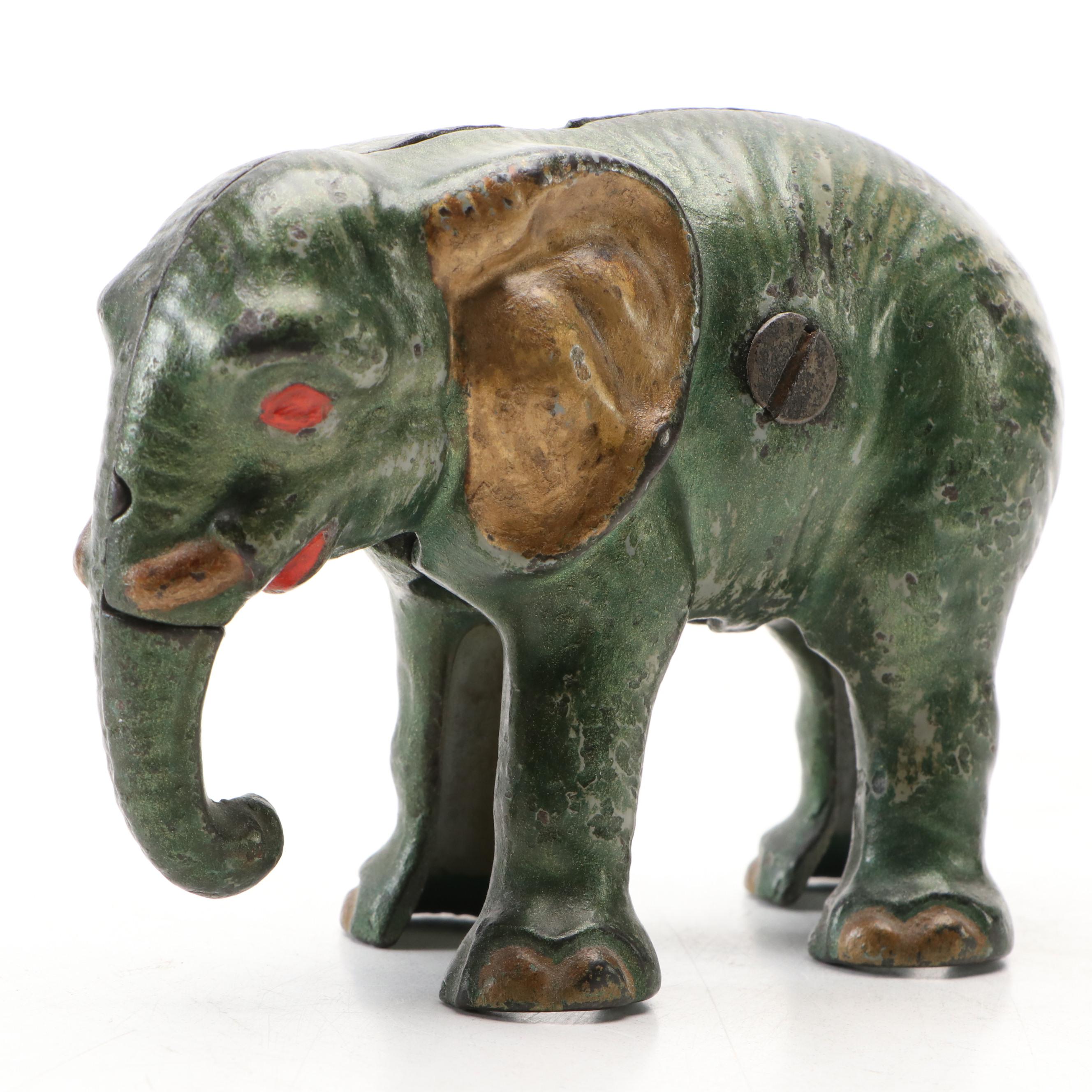 Cold-Painted Cast Iron Green and Gold Baby Elephant Coin Bank