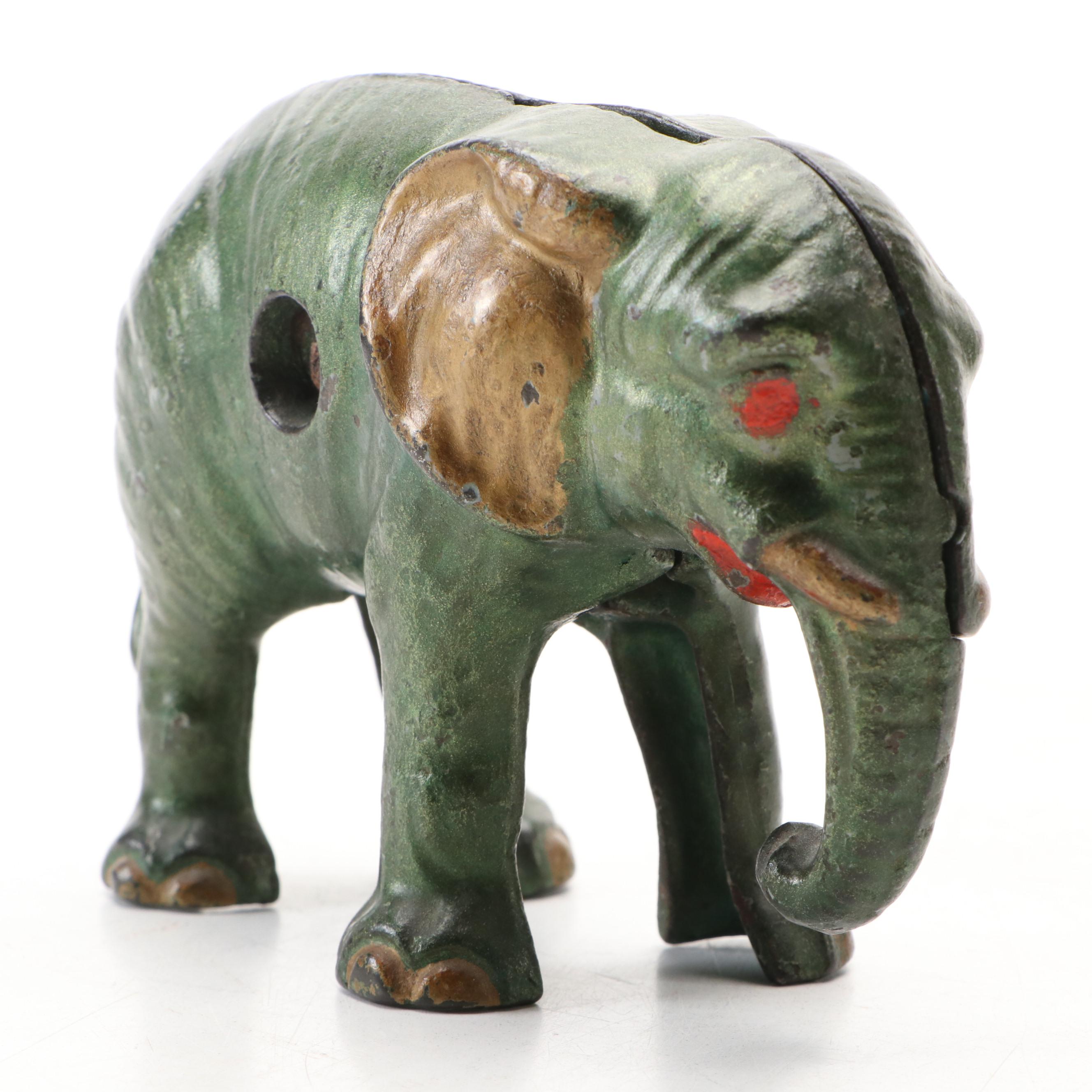 Cold-Painted Cast Iron Green and Gold Baby Elephant Coin Bank