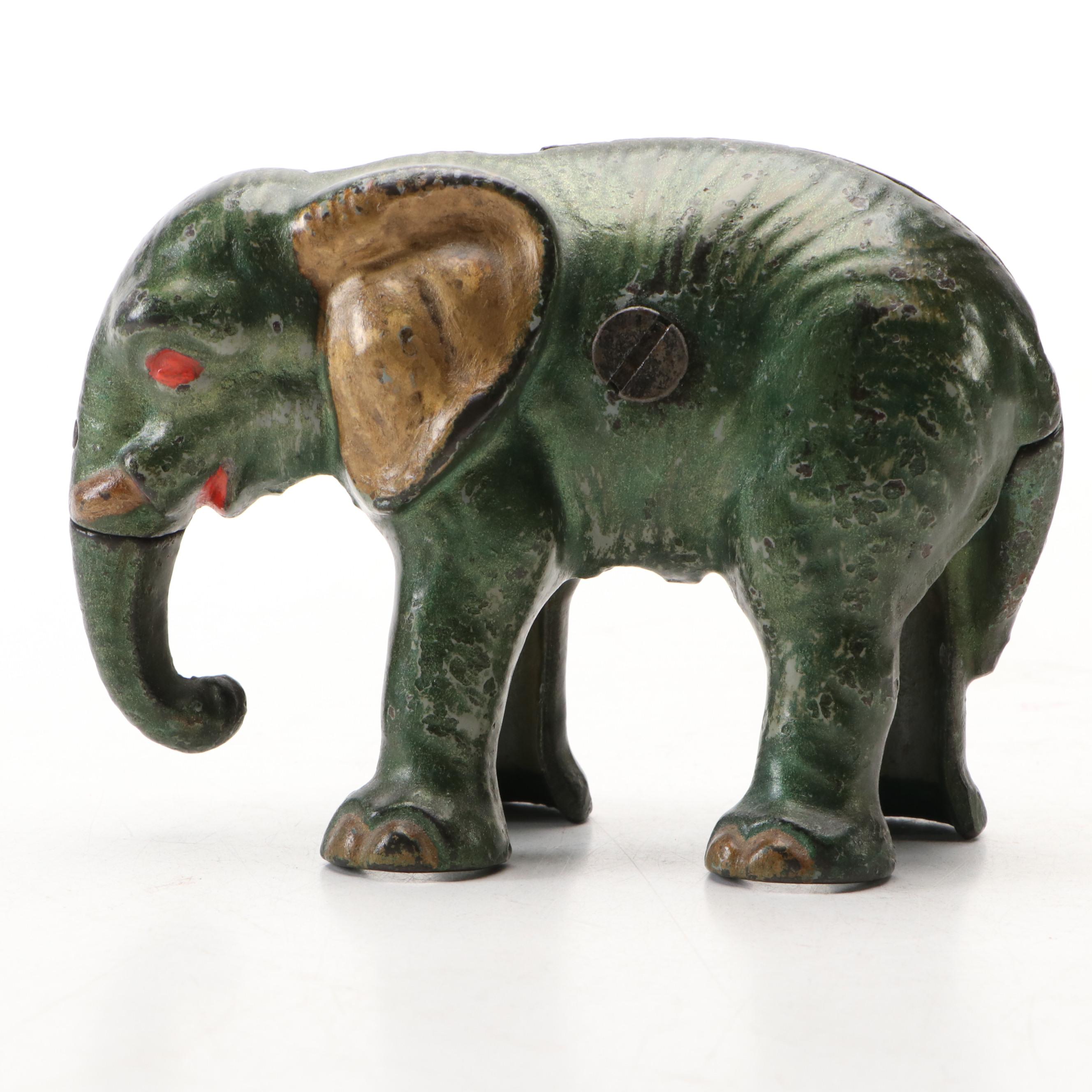 Cold-Painted Cast Iron Green and Gold Baby Elephant Coin Bank