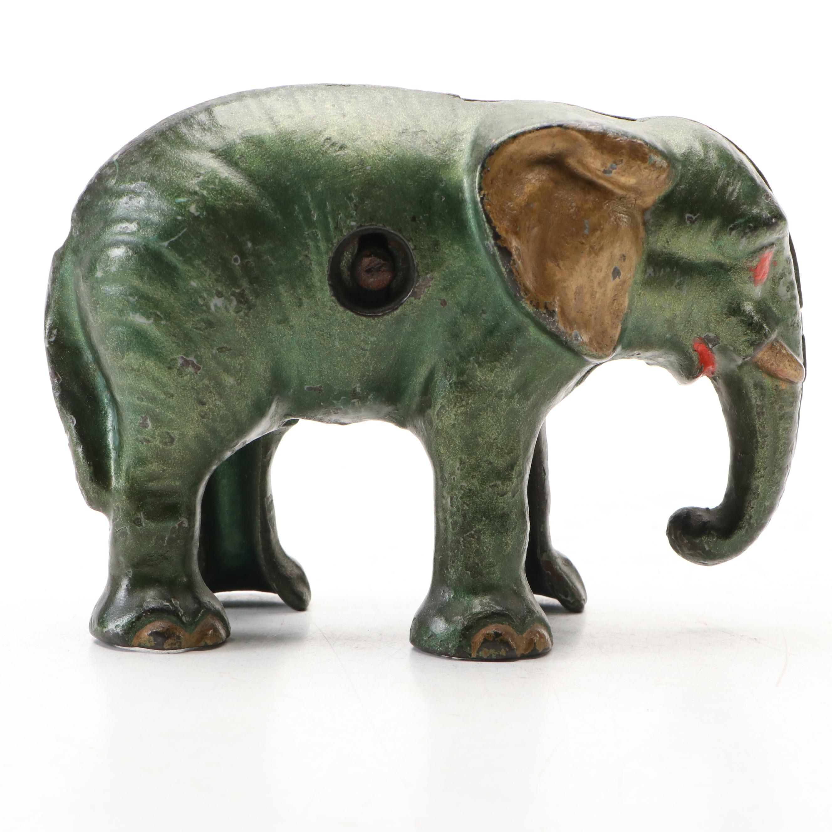 Cold-Painted Cast Iron Green and Gold Baby Elephant Coin Bank