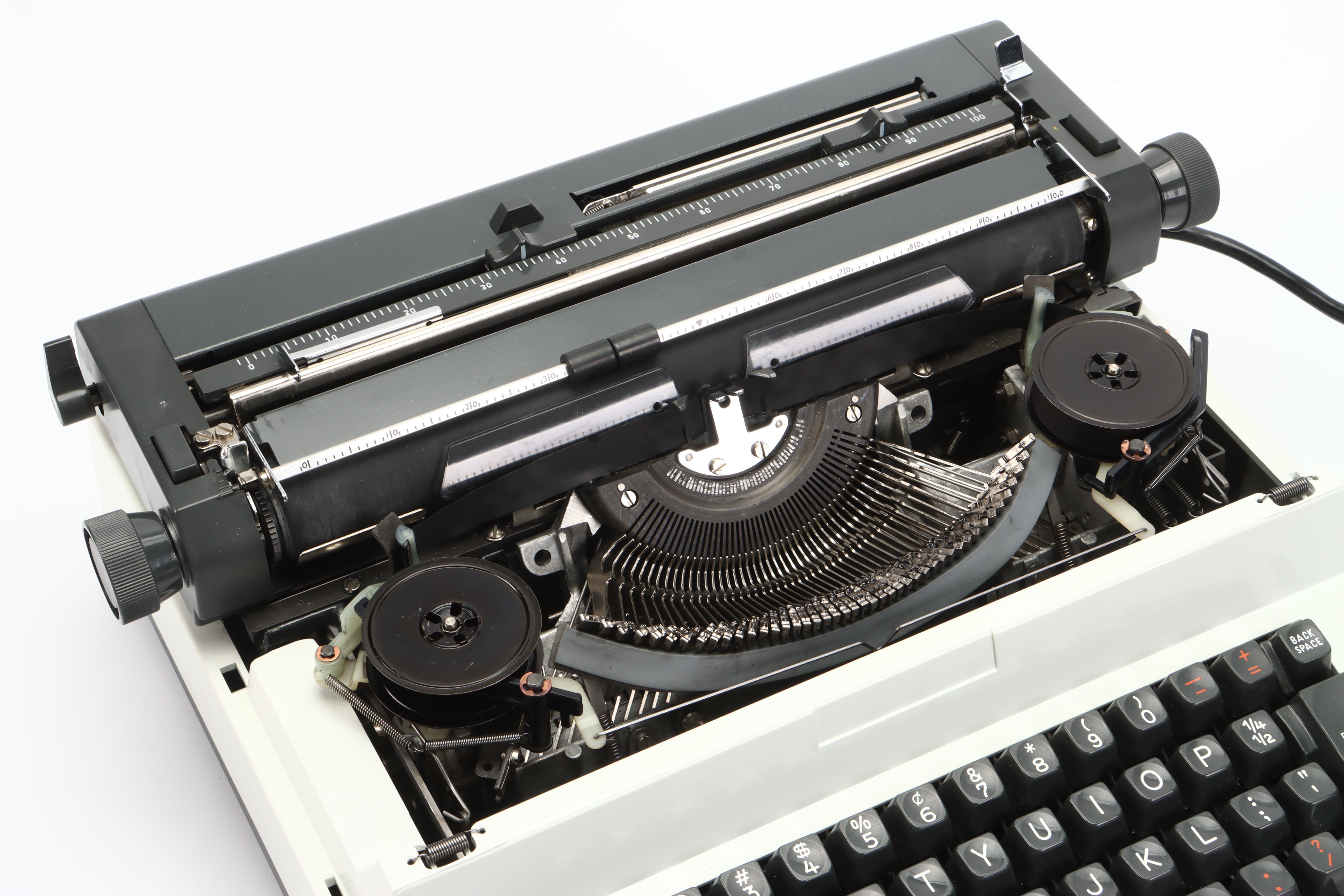 Olympia Report de Luxe Electric Typewriter with Carrying Case, 1970s