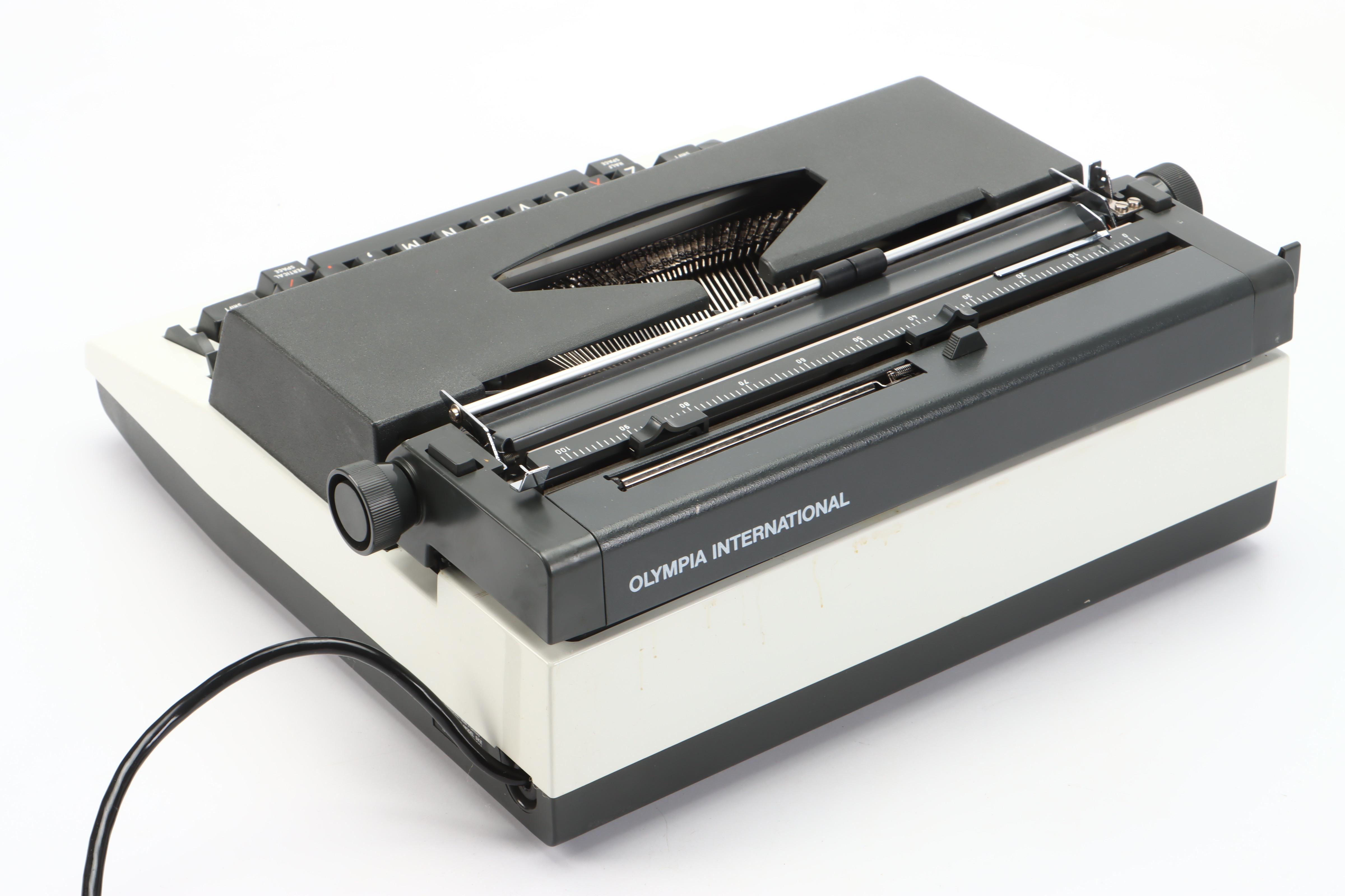 Olympia Report de Luxe Electric Typewriter with Carrying Case, 1970s