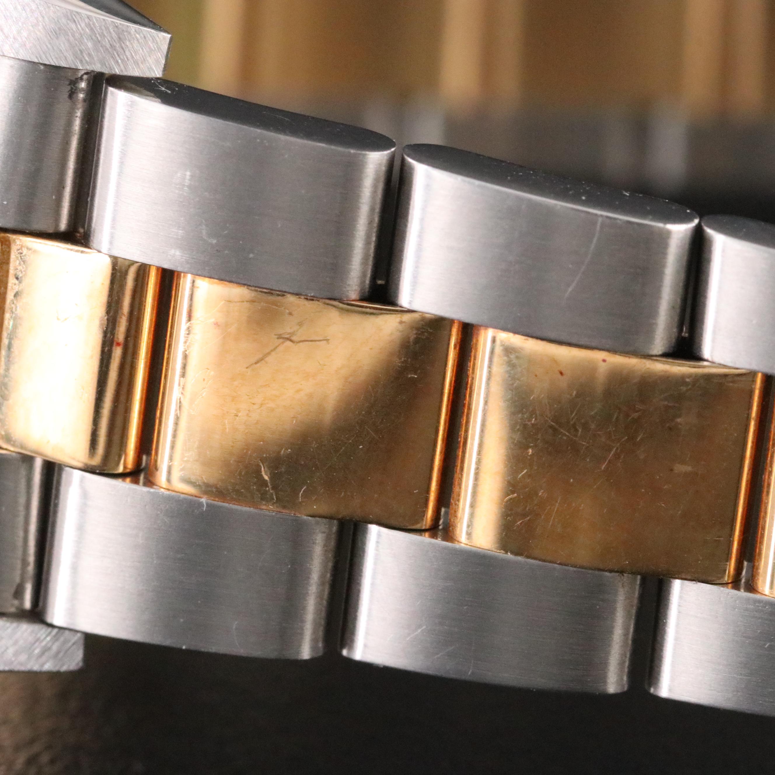 2005 Rolex Oyster Perpetual Date Engine Turned Bezel Watch