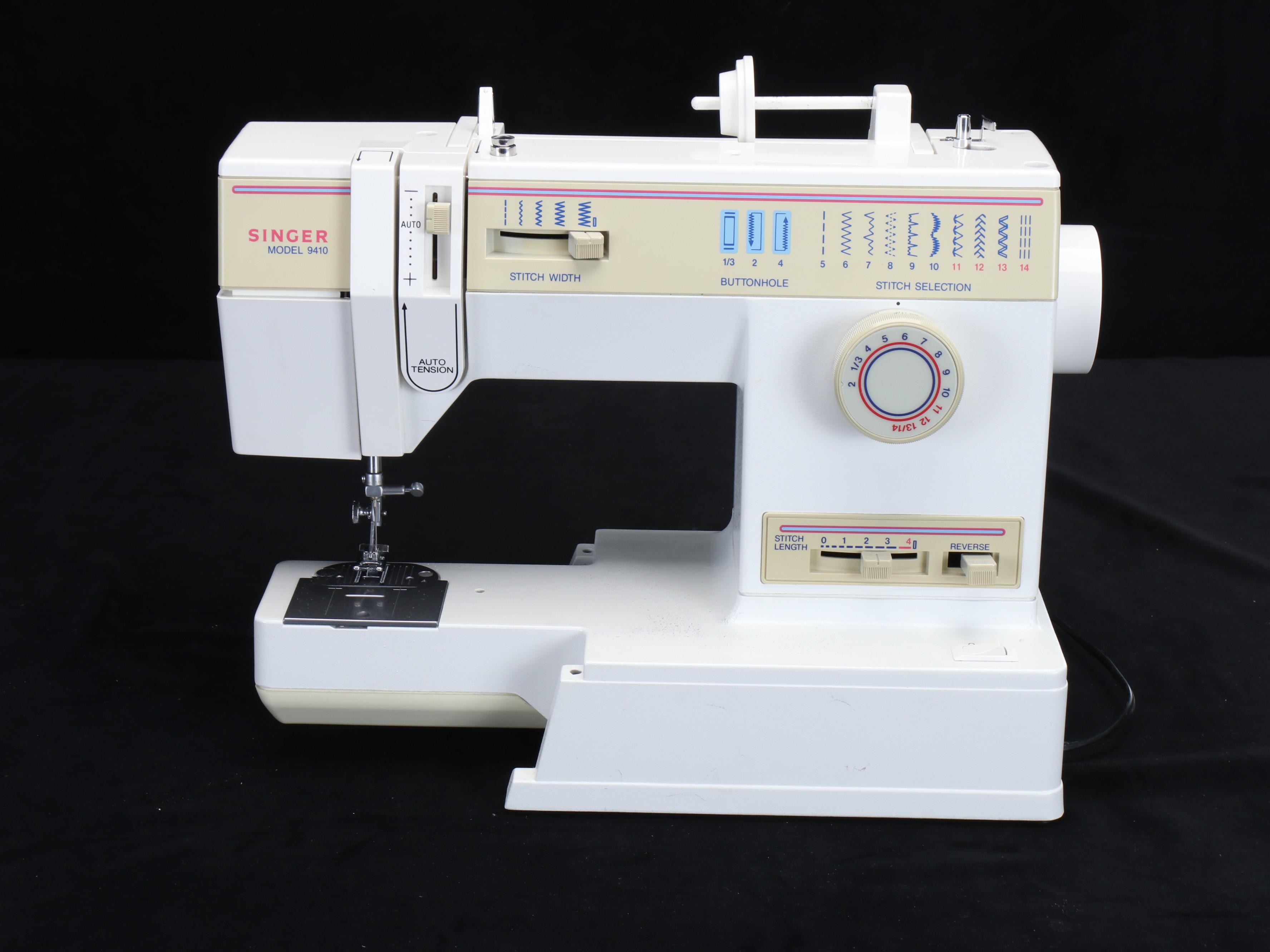 Singer Model 9410 Portable Electric Sewing Machine with Carry Case, Notions