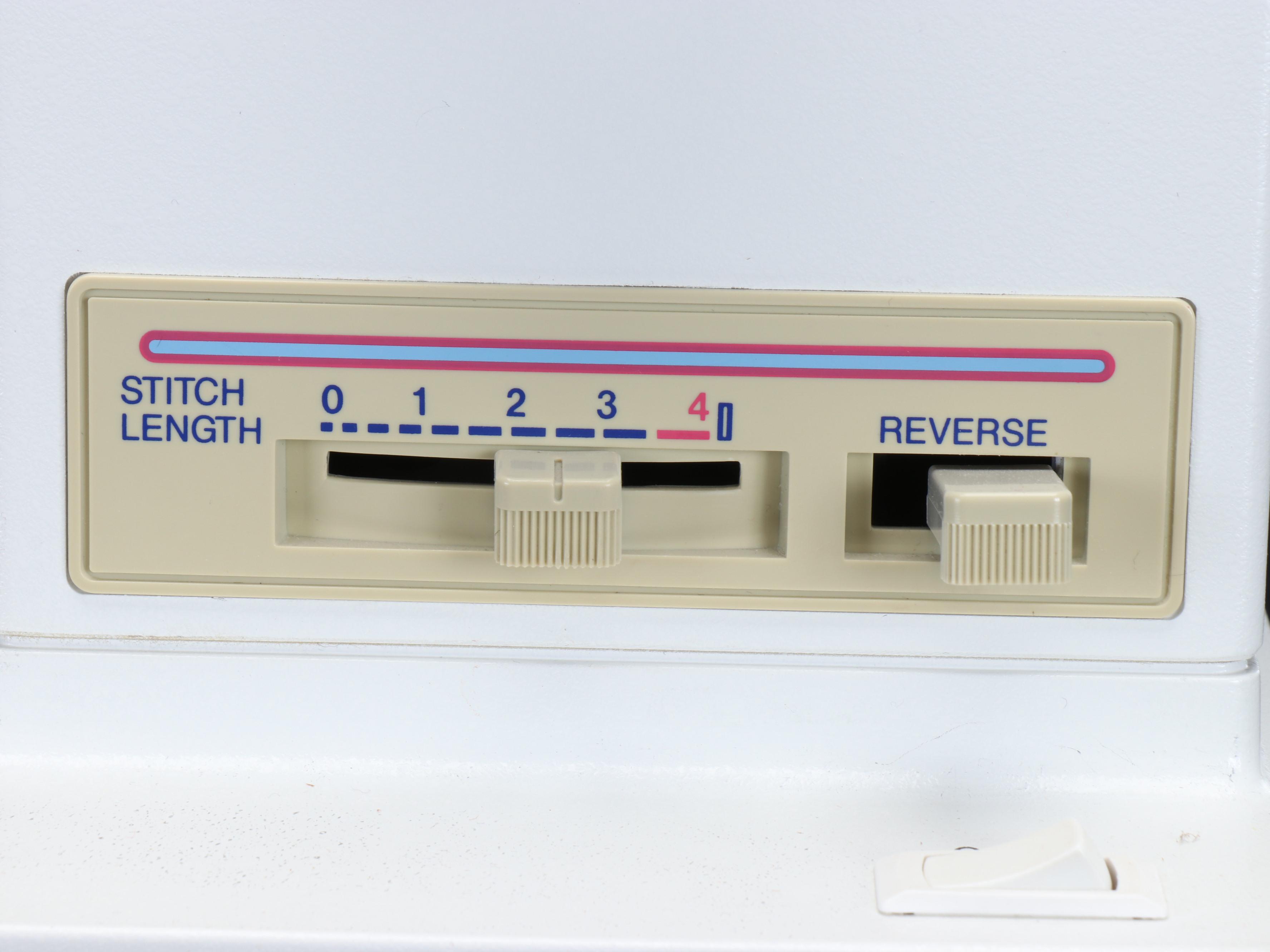 Singer Model 9410 Portable Electric Sewing Machine with Carry Case, Notions