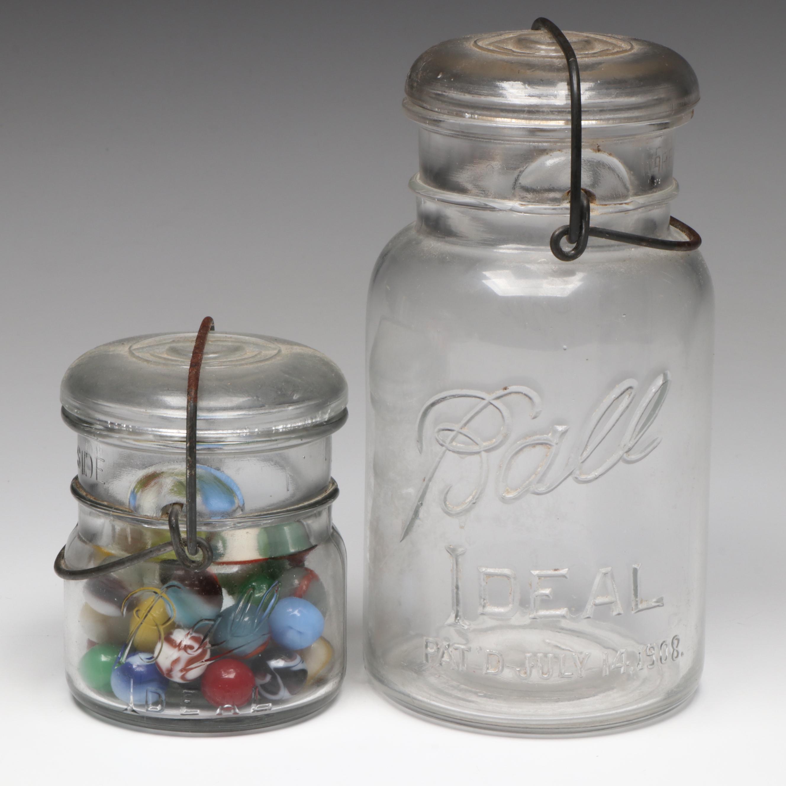 Ball and Other Glass Jars with Tin Litho Spinning Top and Marbles