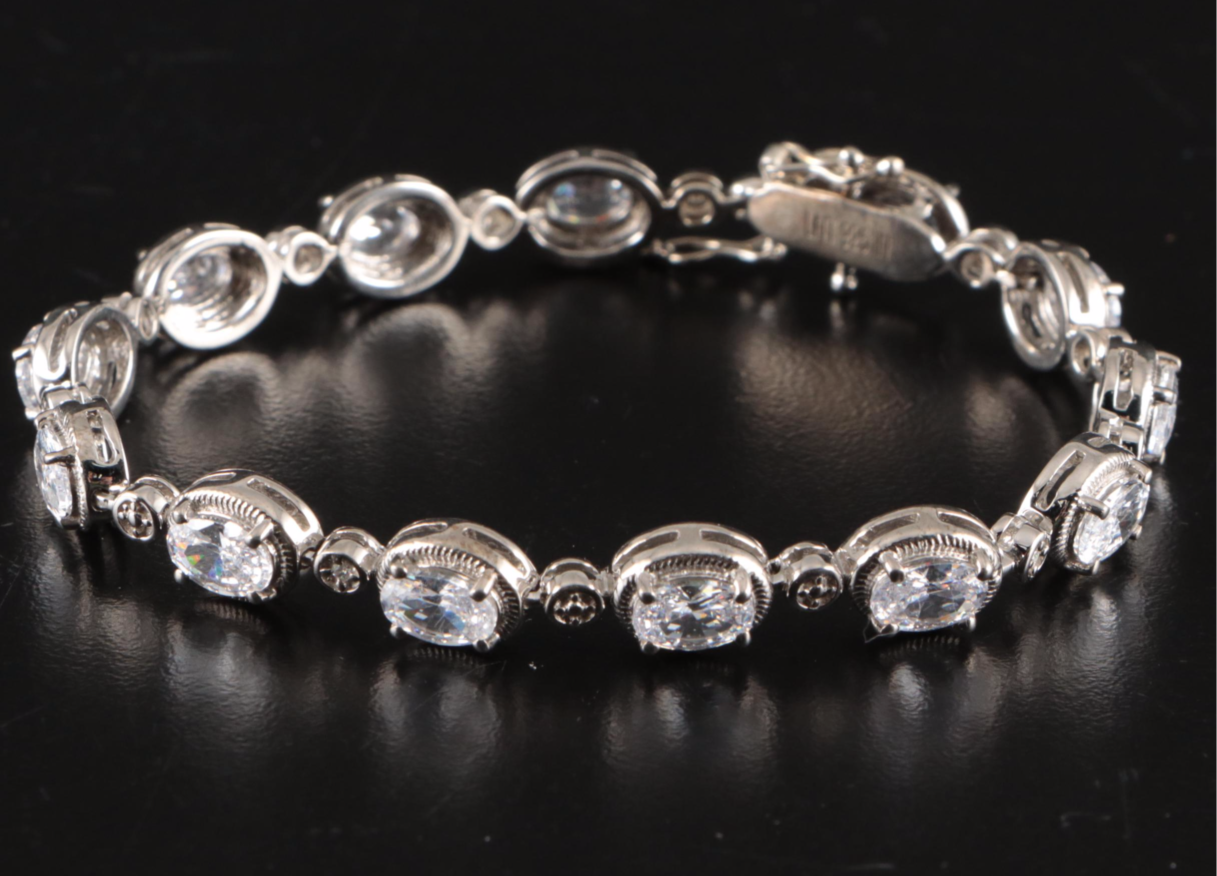 17 Assorted Sterling Silver Bracelets, Earrings, Necklaces, Pendants, and Rings