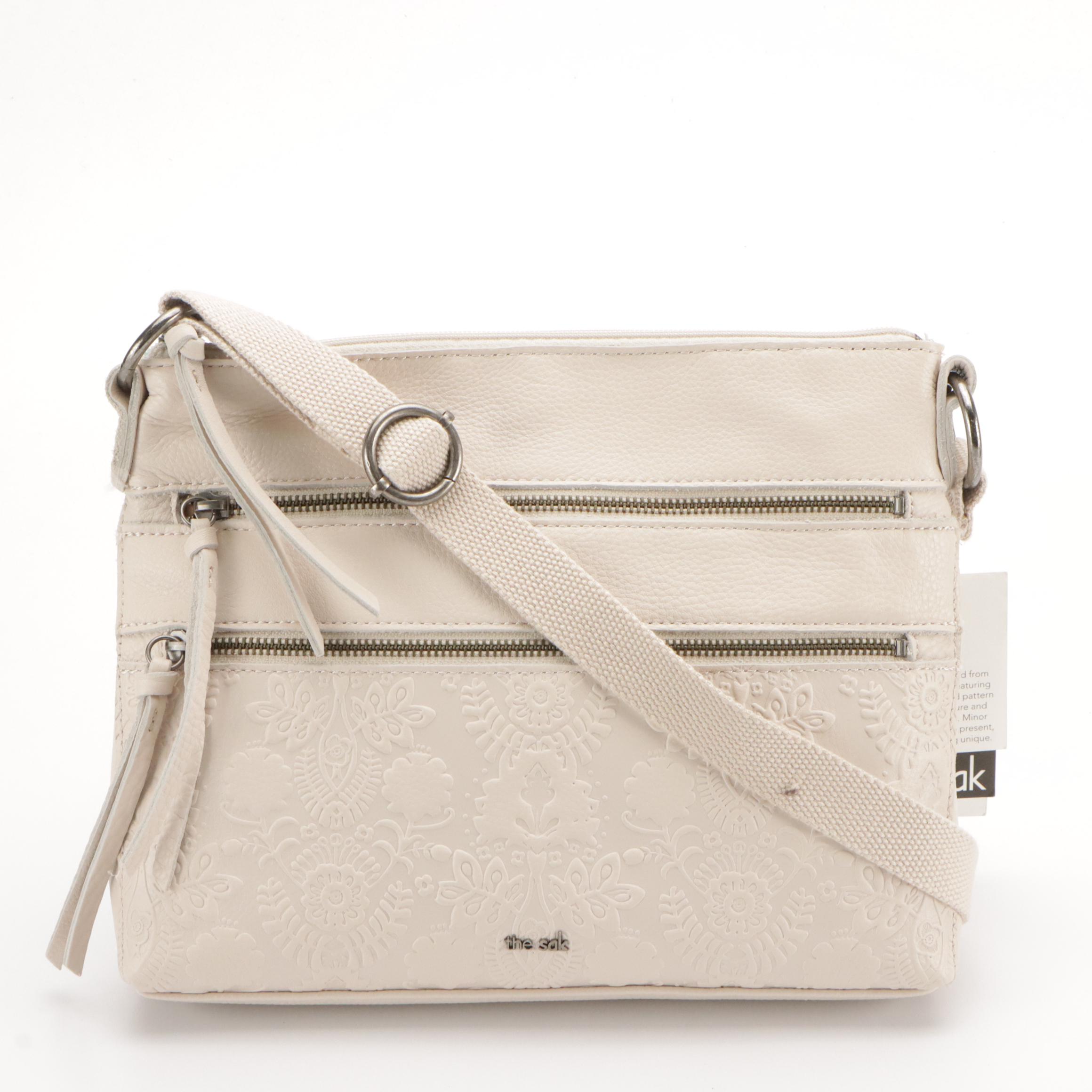 The Sak Crossbody Bags in Reseda Leather and Pebble Grain Leather