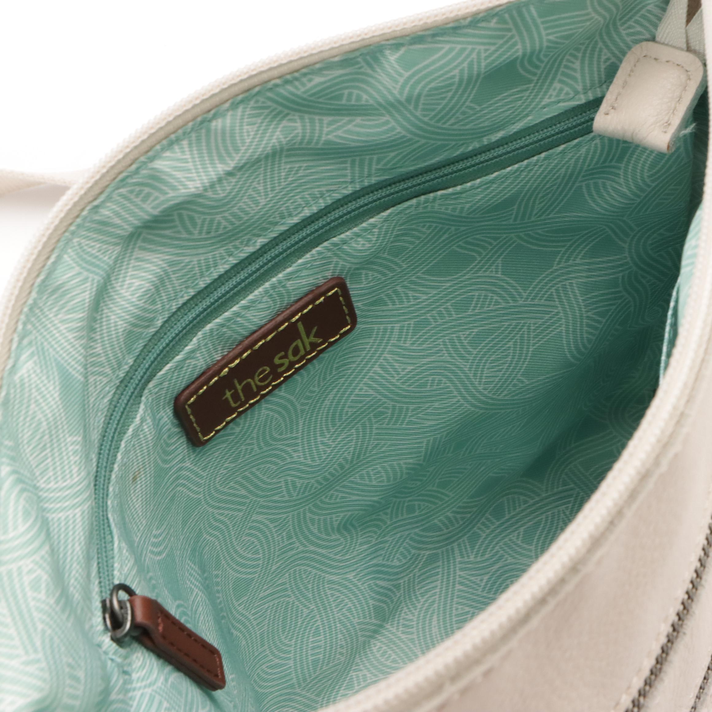 The Sak Crossbody Bags in Reseda Leather and Pebble Grain Leather