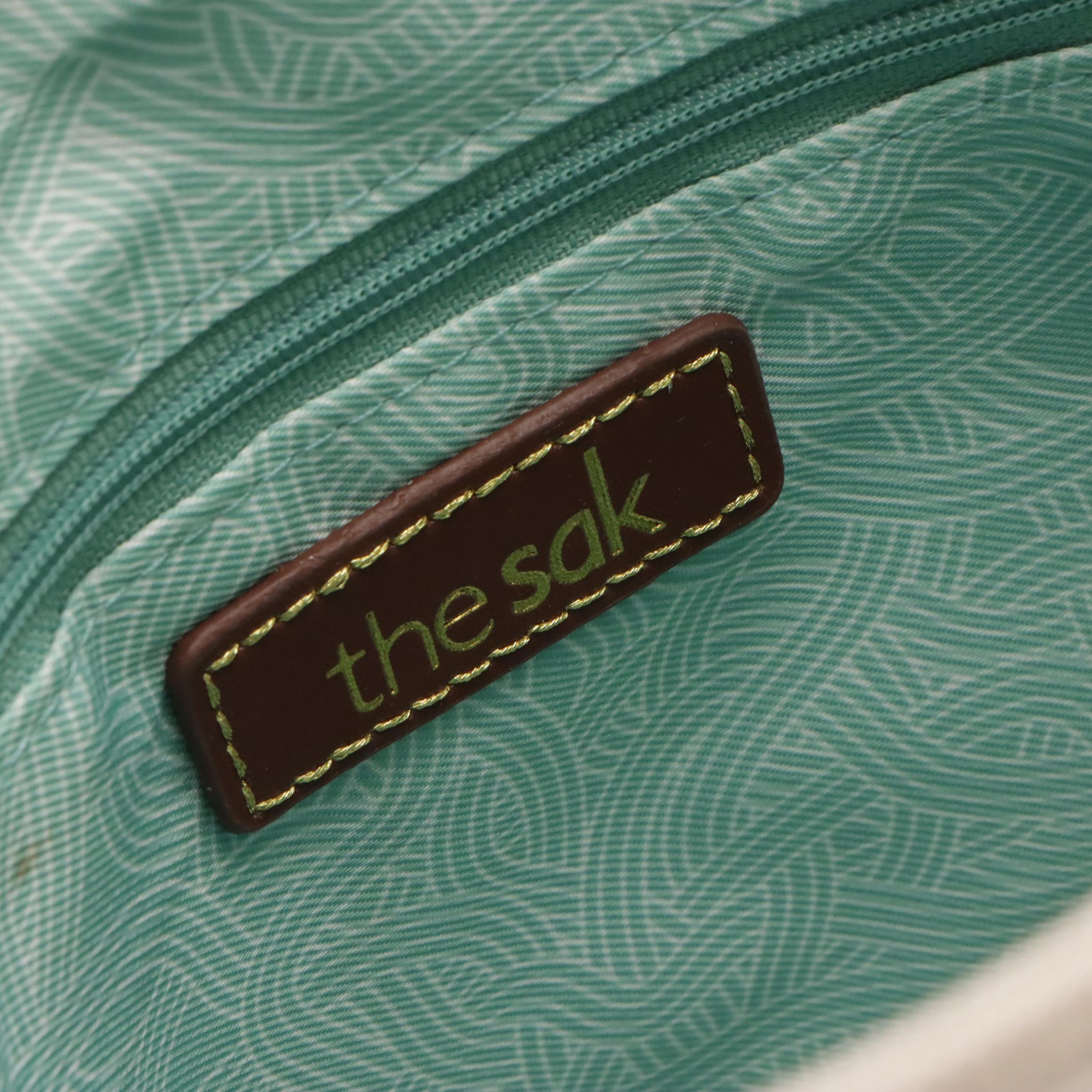 The Sak Crossbody Bags in Reseda Leather and Pebble Grain Leather