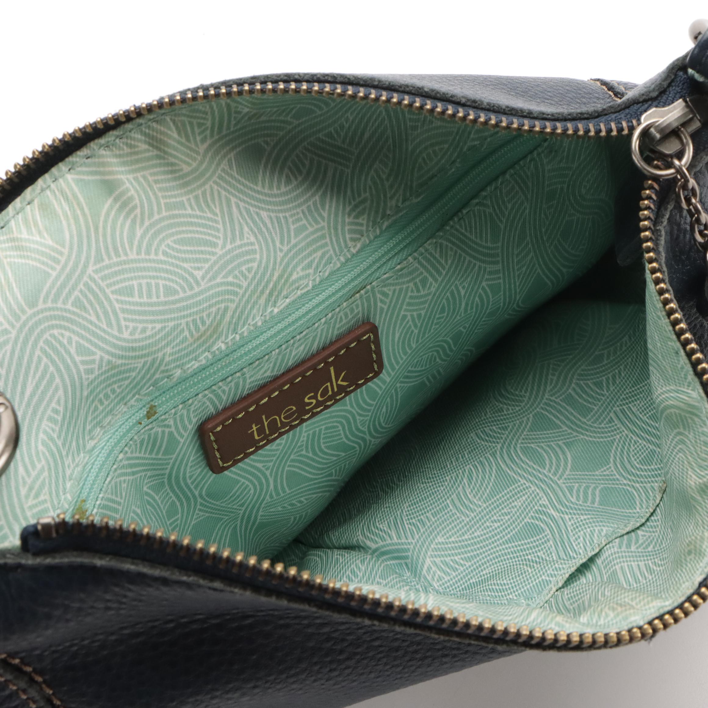 The Sak Crossbody Bags in Reseda Leather and Pebble Grain Leather