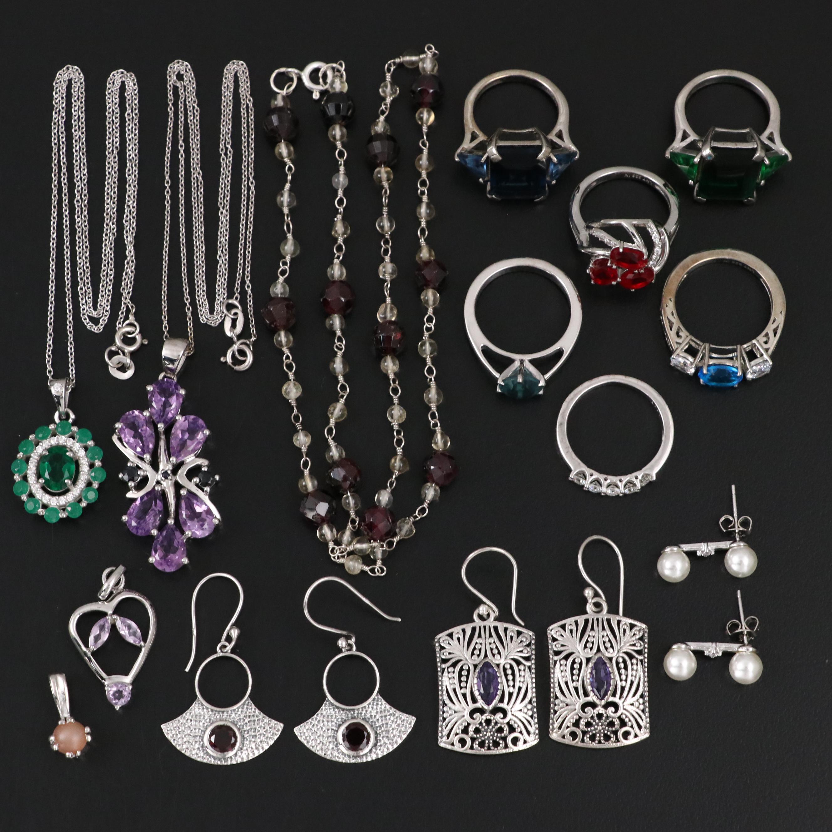 Group of 14 Assorted Sterling Silver Rings, Necklaces, Earrings, and Pendants