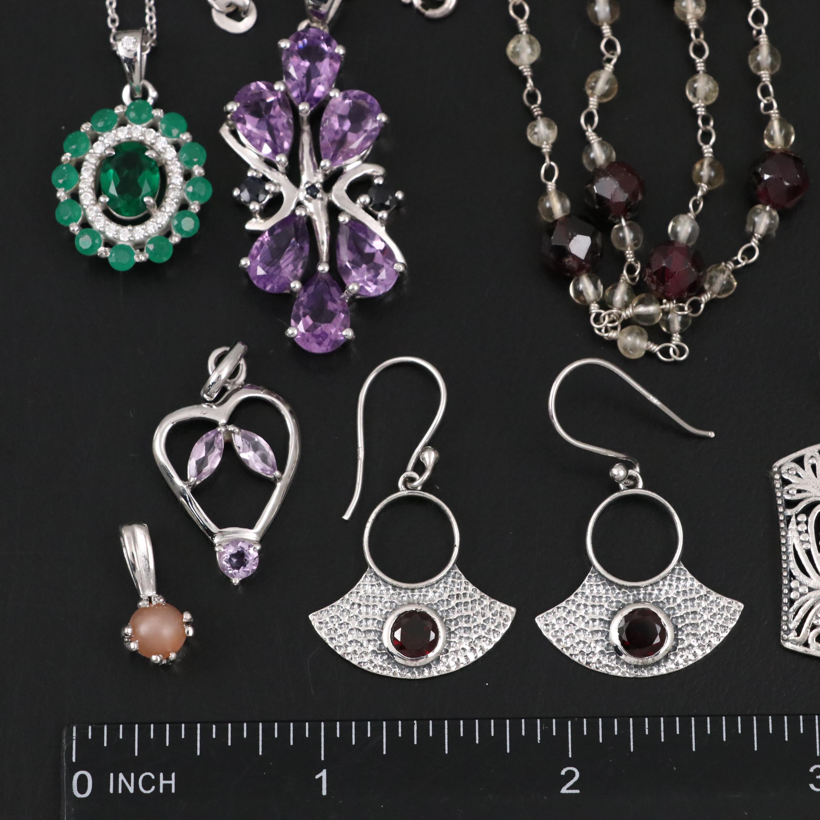 Group of 14 Assorted Sterling Silver Rings, Necklaces, Earrings, and Pendants