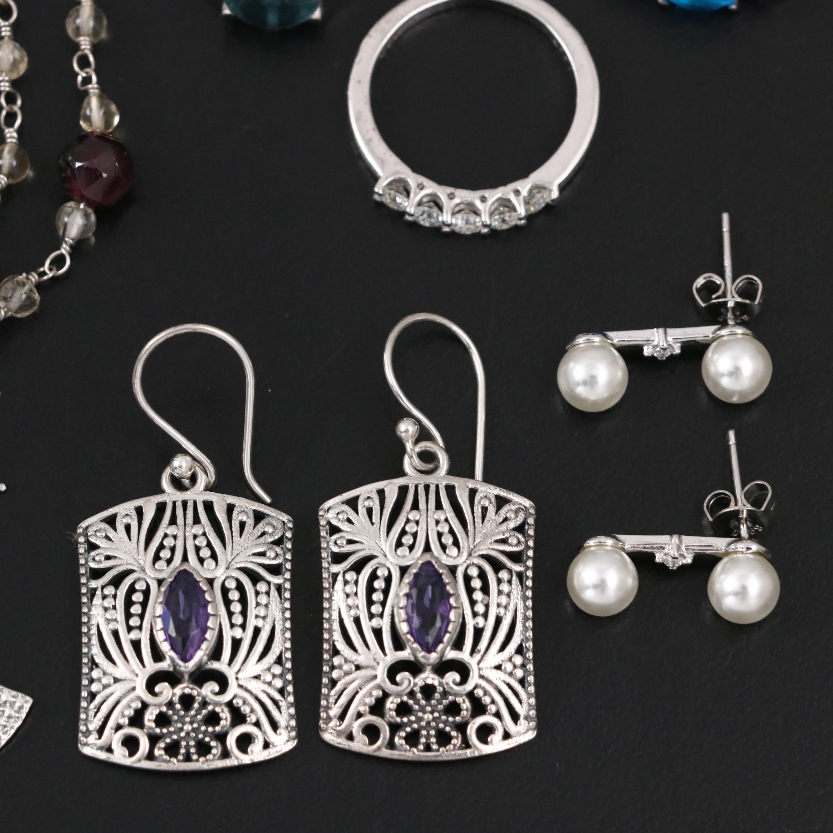 Group of 14 Assorted Sterling Silver Rings, Necklaces, Earrings, and Pendants