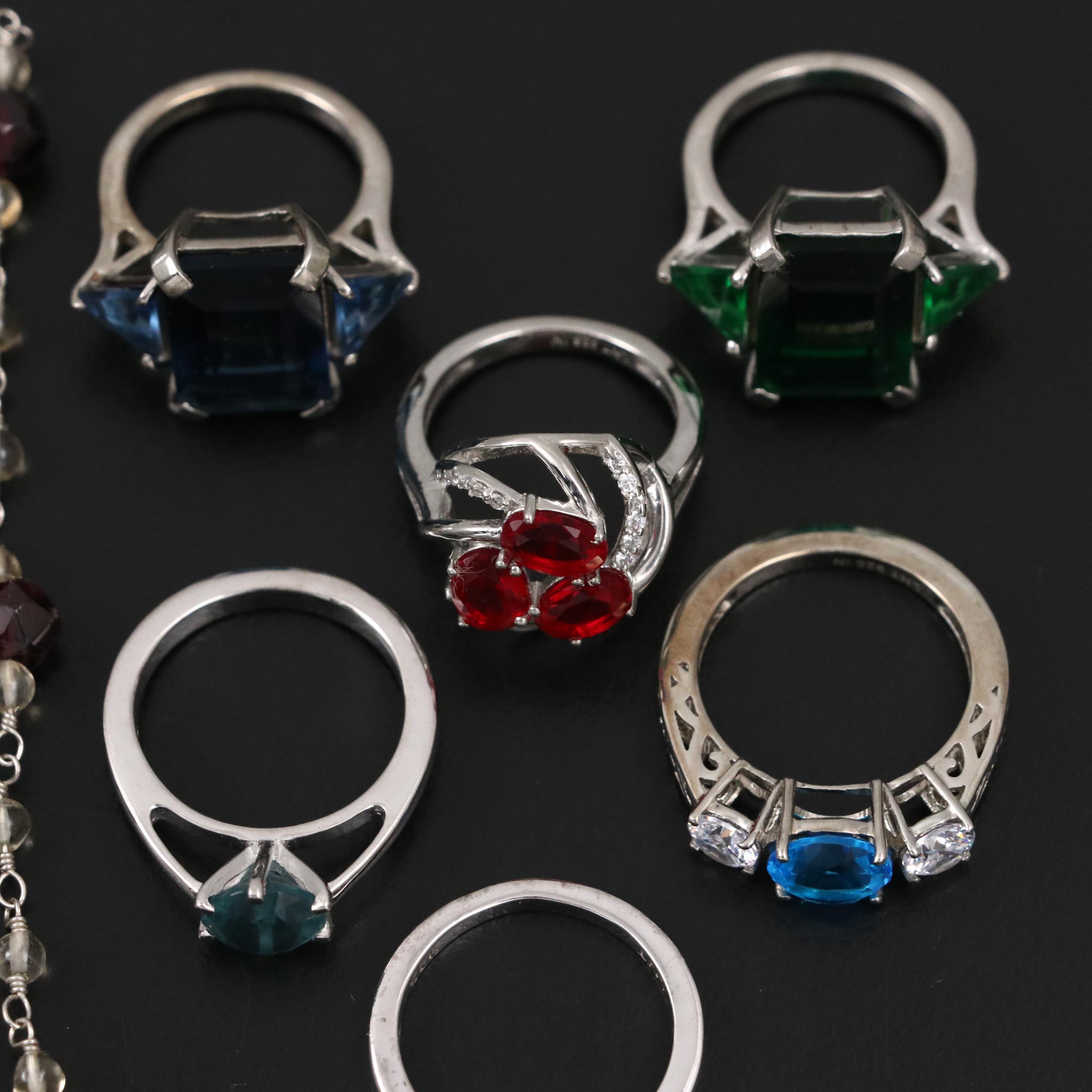 Group of 14 Assorted Sterling Silver Rings, Necklaces, Earrings, and Pendants