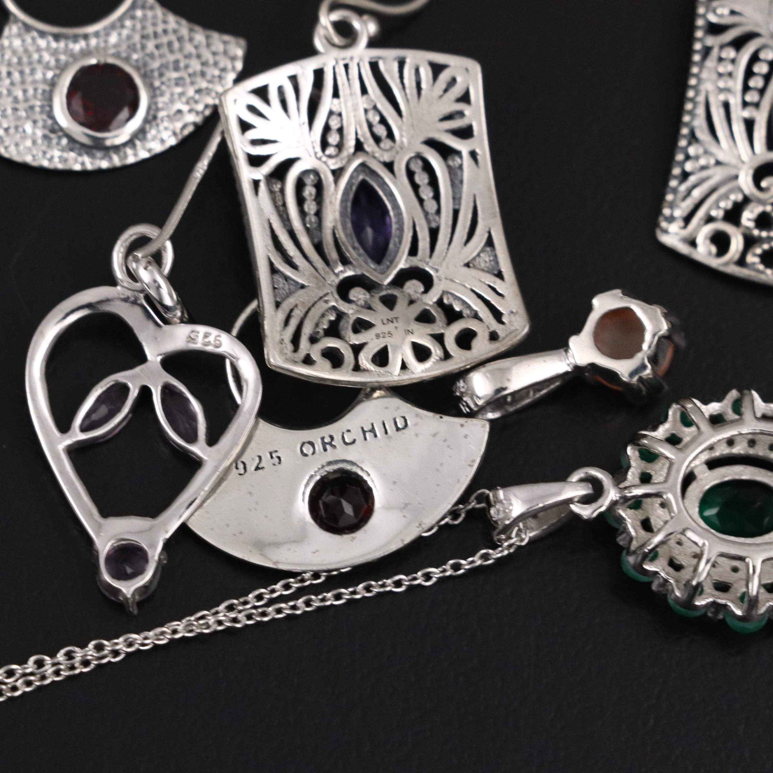 Group of 14 Assorted Sterling Silver Rings, Necklaces, Earrings, and Pendants