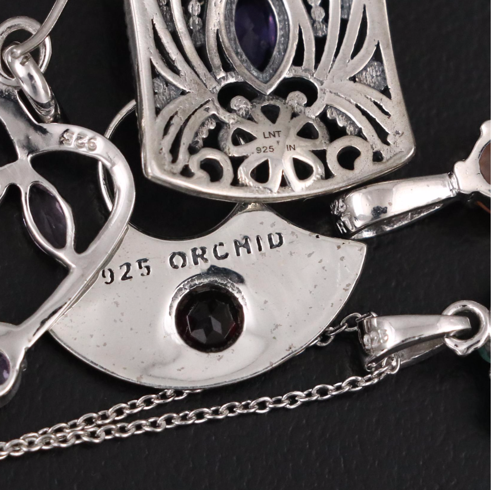 Group of 14 Assorted Sterling Silver Rings, Necklaces, Earrings, and Pendants