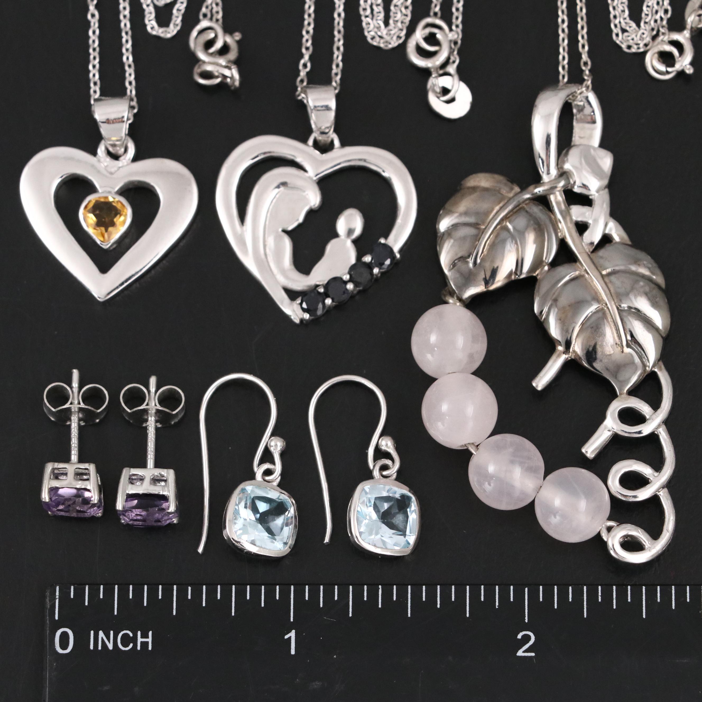 14 Assorted Sterling Silver Rings, Necklaces, Earrings, and Pendants.