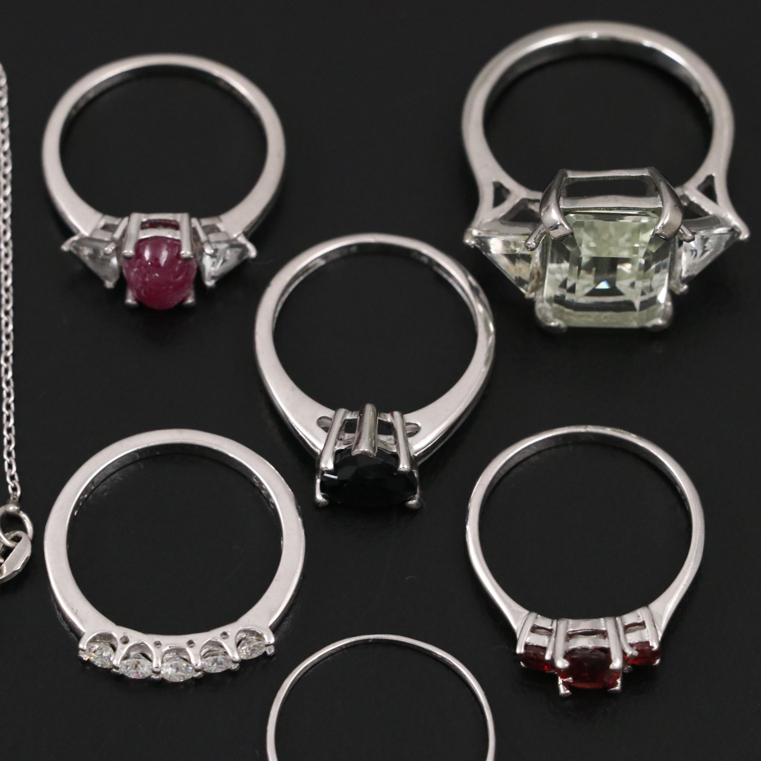 14 Assorted Sterling Silver Rings, Necklaces, Earrings, and Pendants.