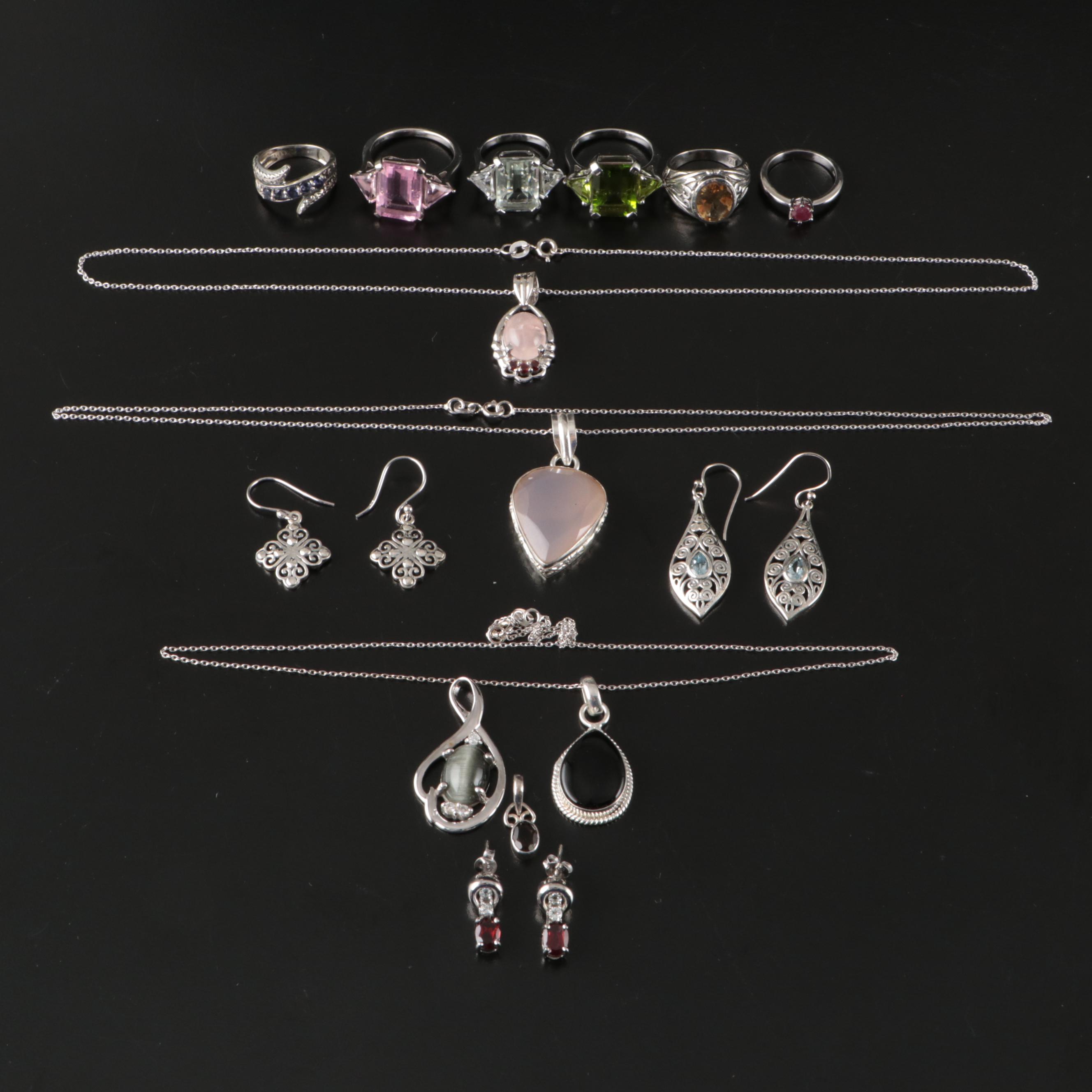 Group of 14 Assorted Sterling Silver Rings, Necklaces, Earrings, and Pendants
