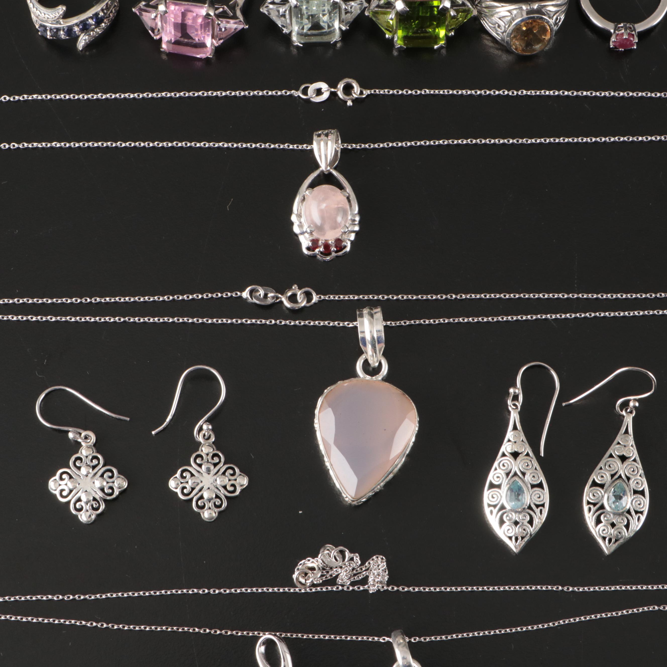 Group of 14 Assorted Sterling Silver Rings, Necklaces, Earrings, and Pendants