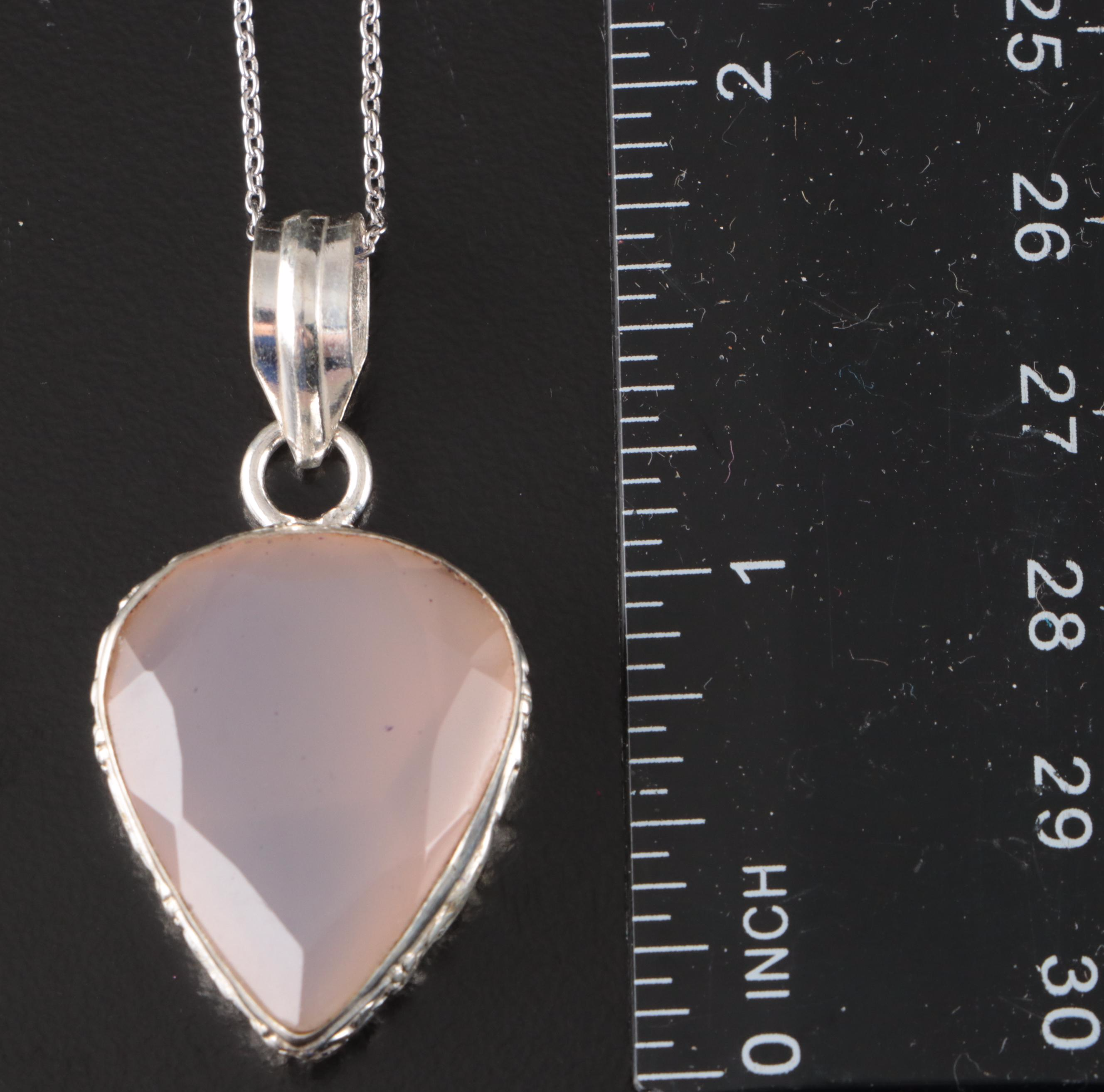 Group of 14 Assorted Sterling Silver Rings, Necklaces, Earrings, and Pendants