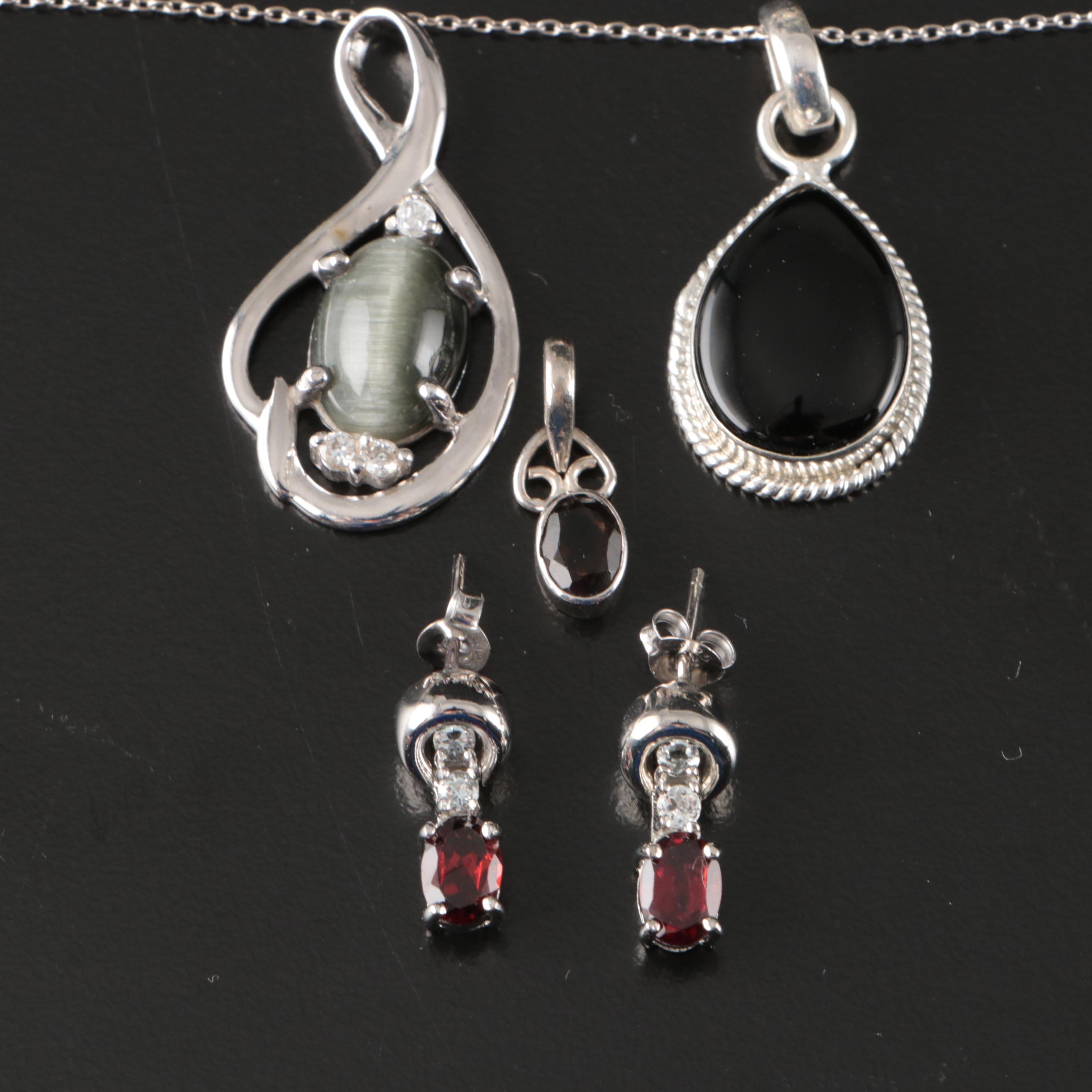 Group of 14 Assorted Sterling Silver Rings, Necklaces, Earrings, and Pendants