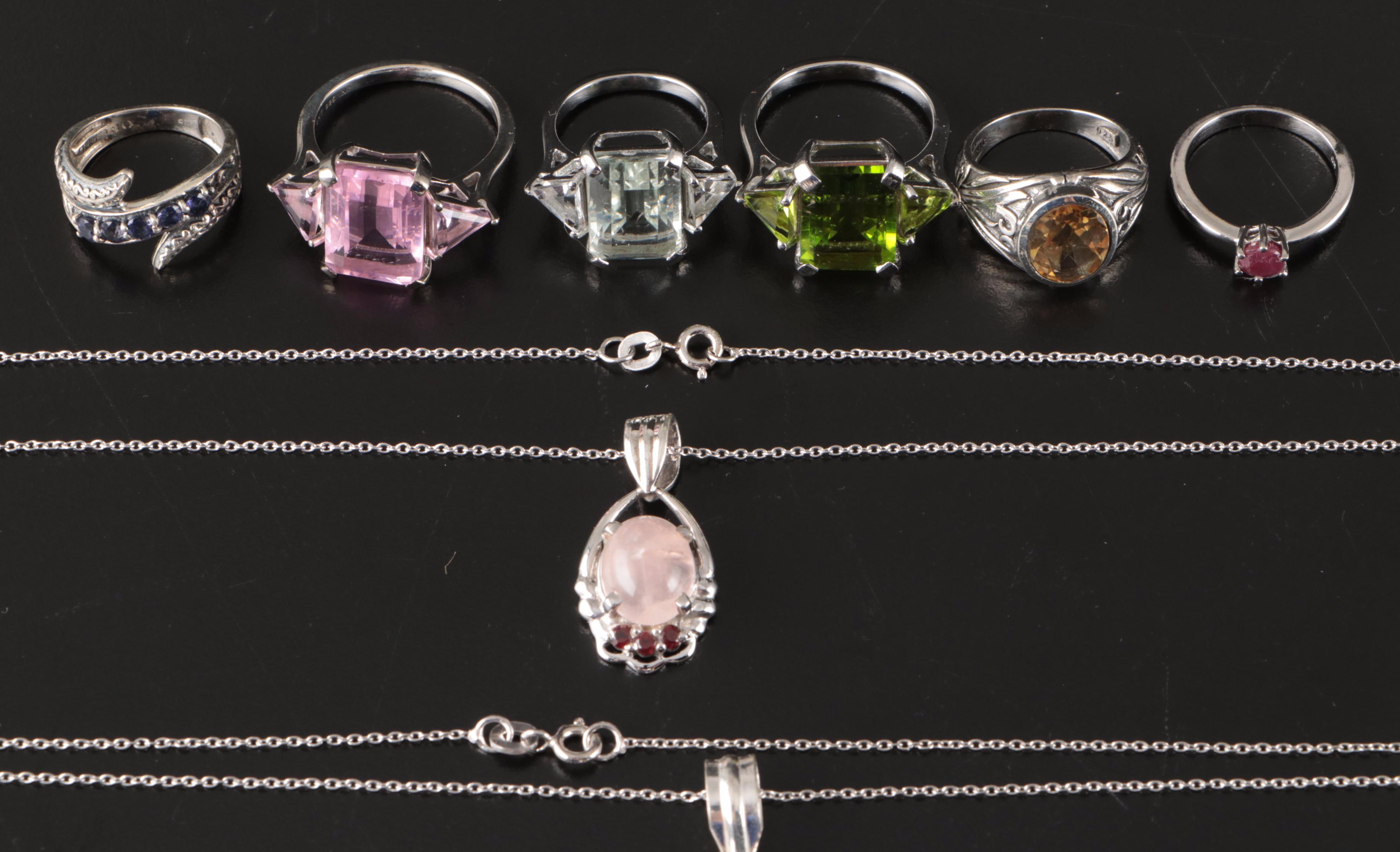 Group of 14 Assorted Sterling Silver Rings, Necklaces, Earrings, and Pendants