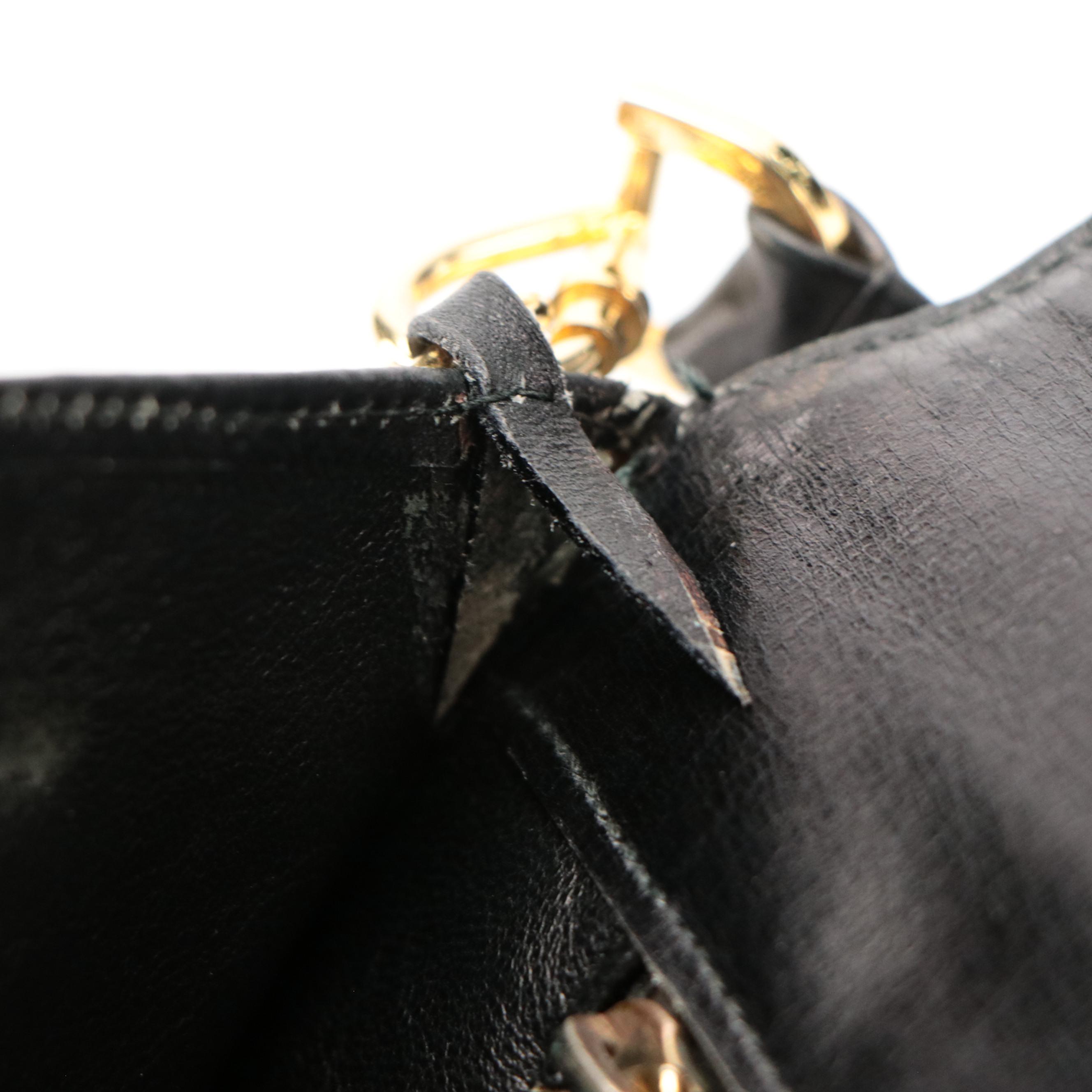 Salvatore Ferragamo Firenze Convertible Clutch in Black Leather