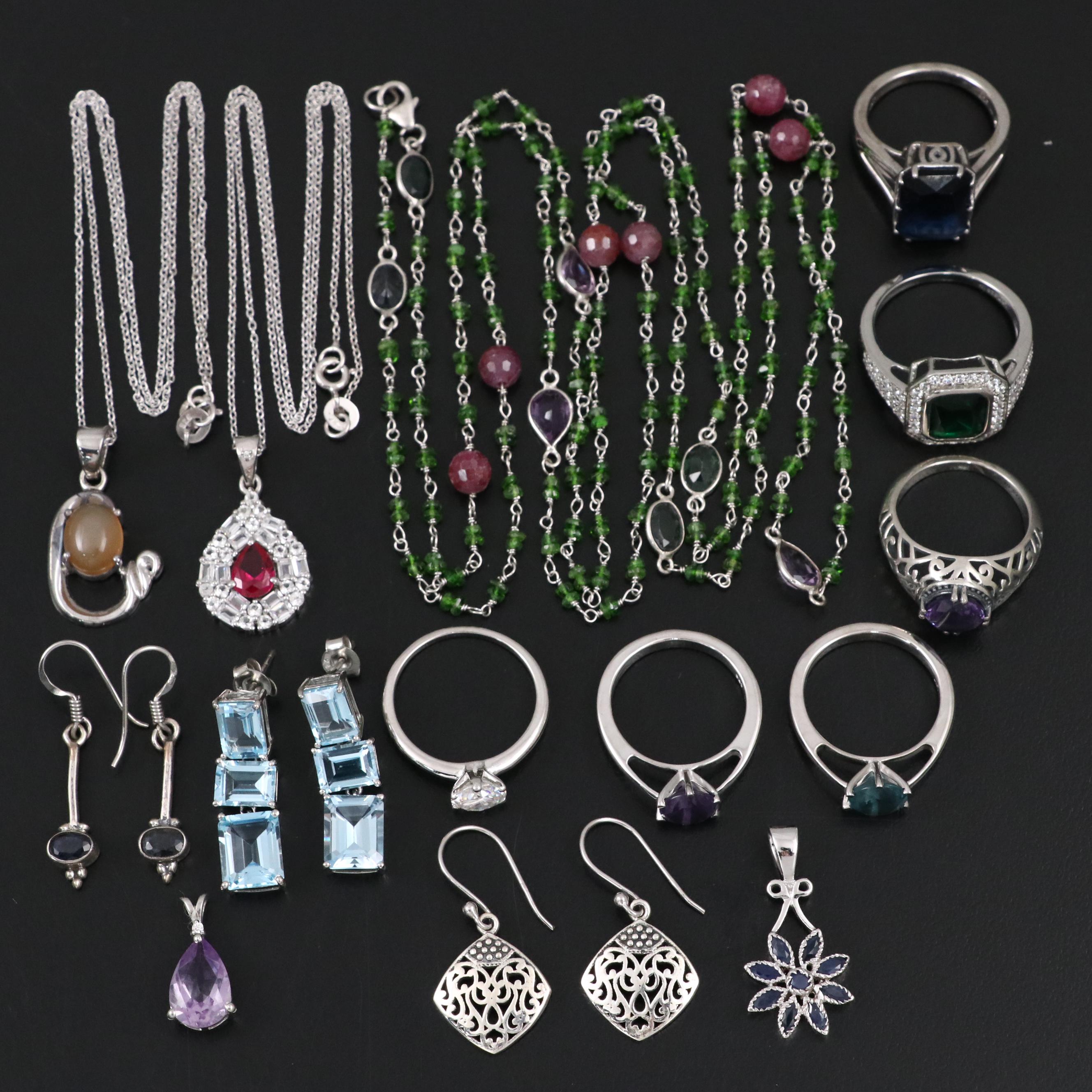 Group of 14 Assorted Sterling Silver Rings, Necklaces, Earrings, and Pendants