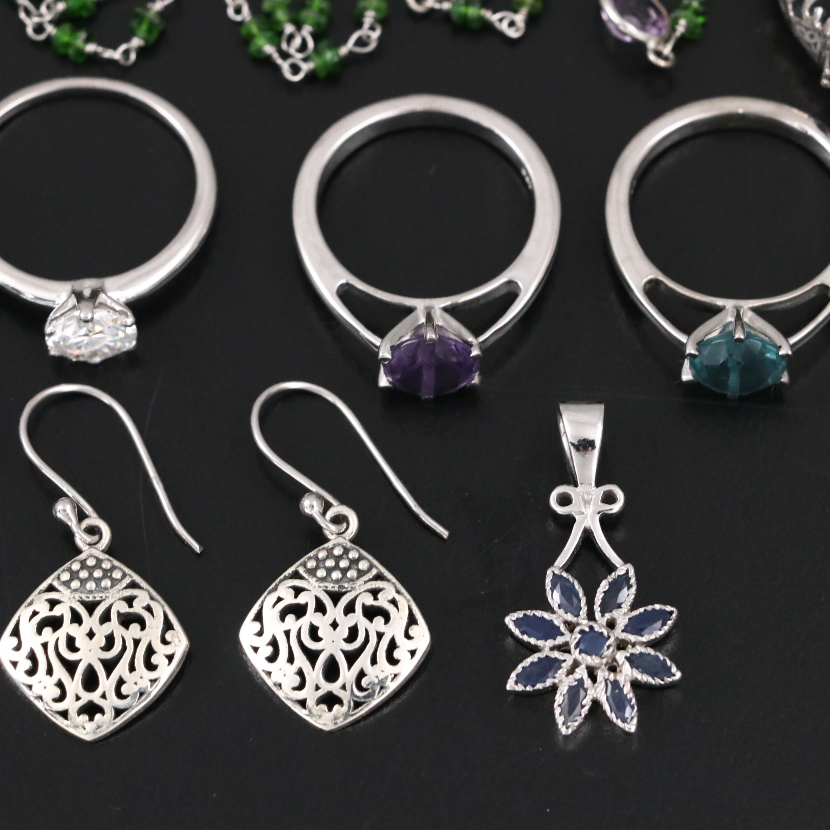 Group of 14 Assorted Sterling Silver Rings, Necklaces, Earrings, and Pendants