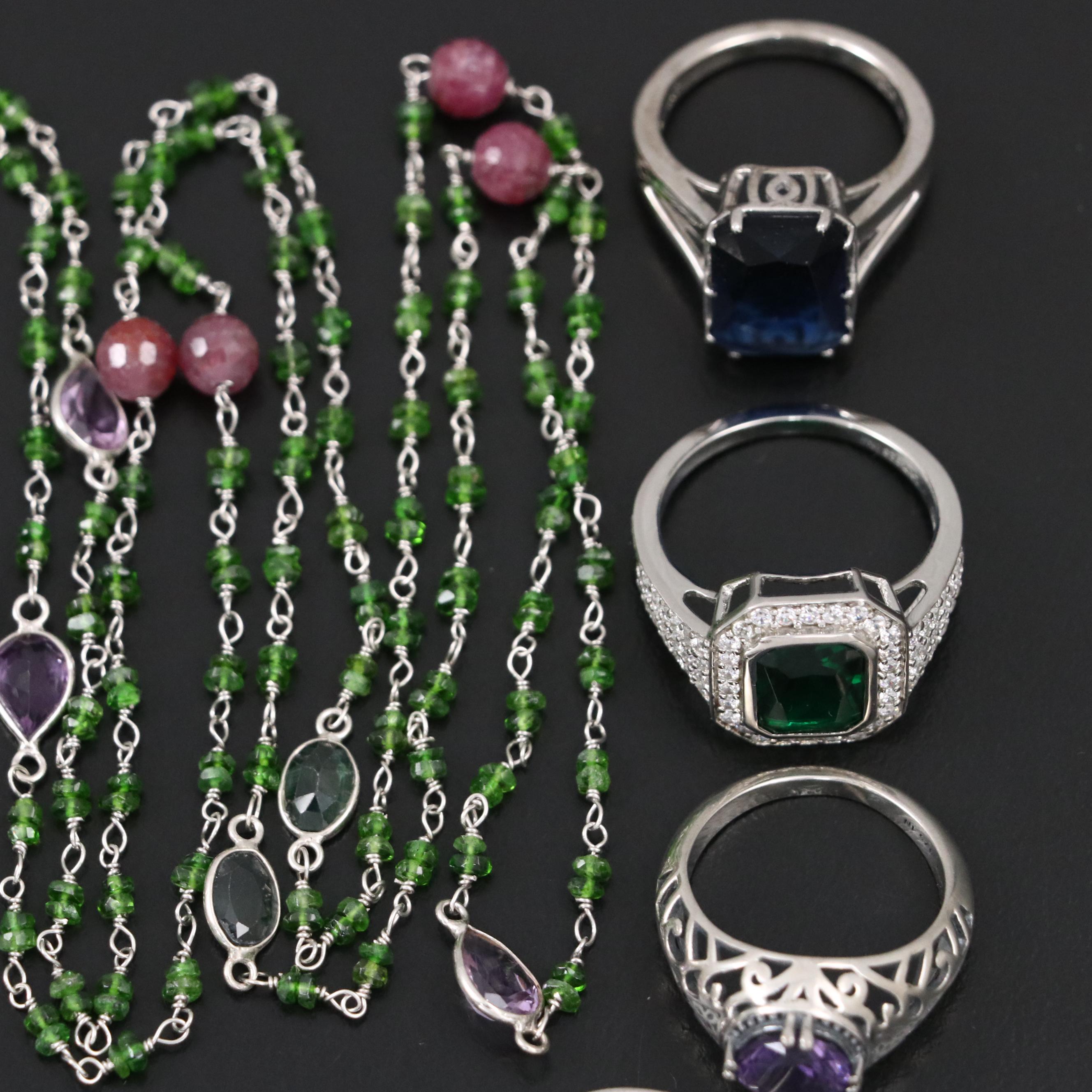 Group of 14 Assorted Sterling Silver Rings, Necklaces, Earrings, and Pendants