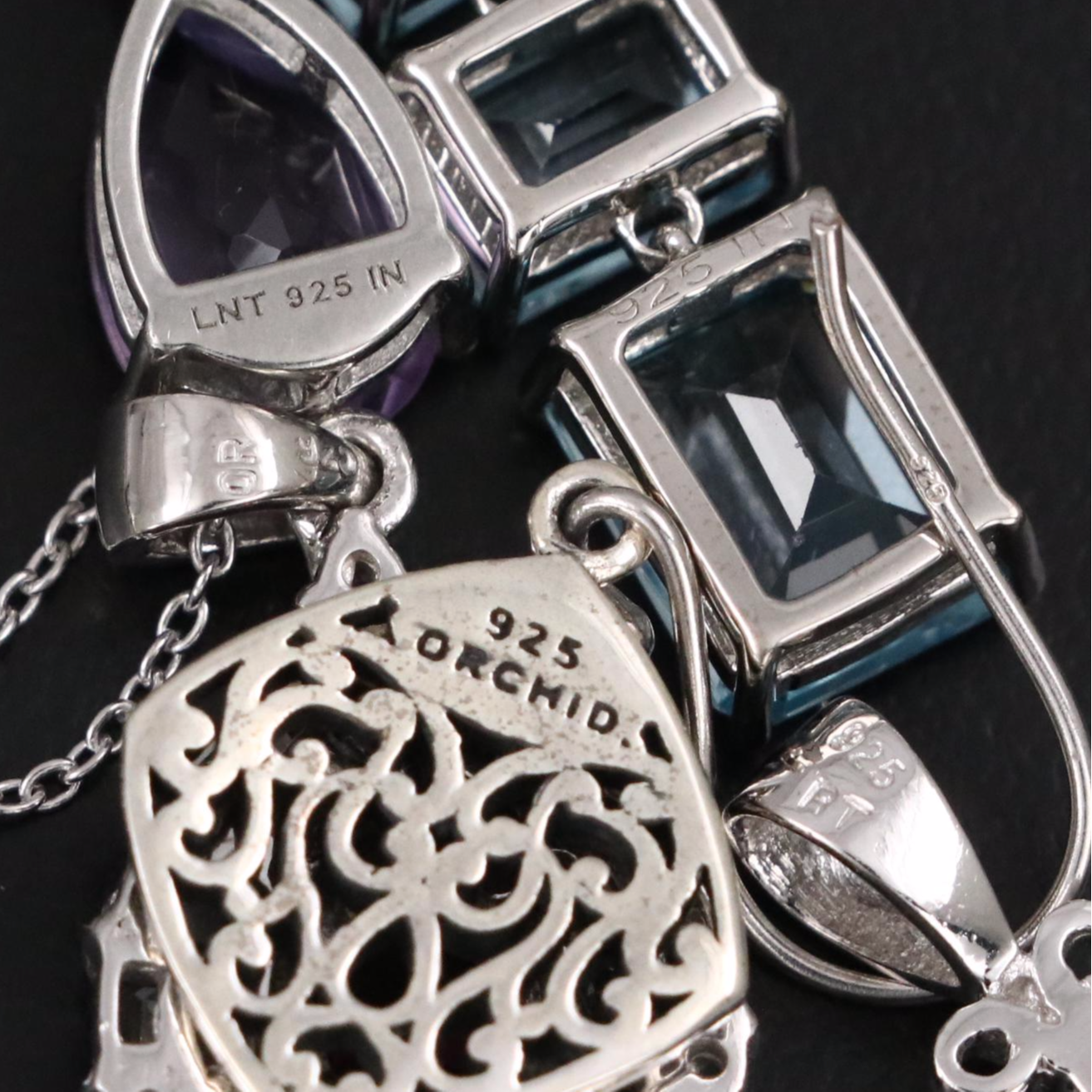 Group of 14 Assorted Sterling Silver Rings, Necklaces, Earrings, and Pendants