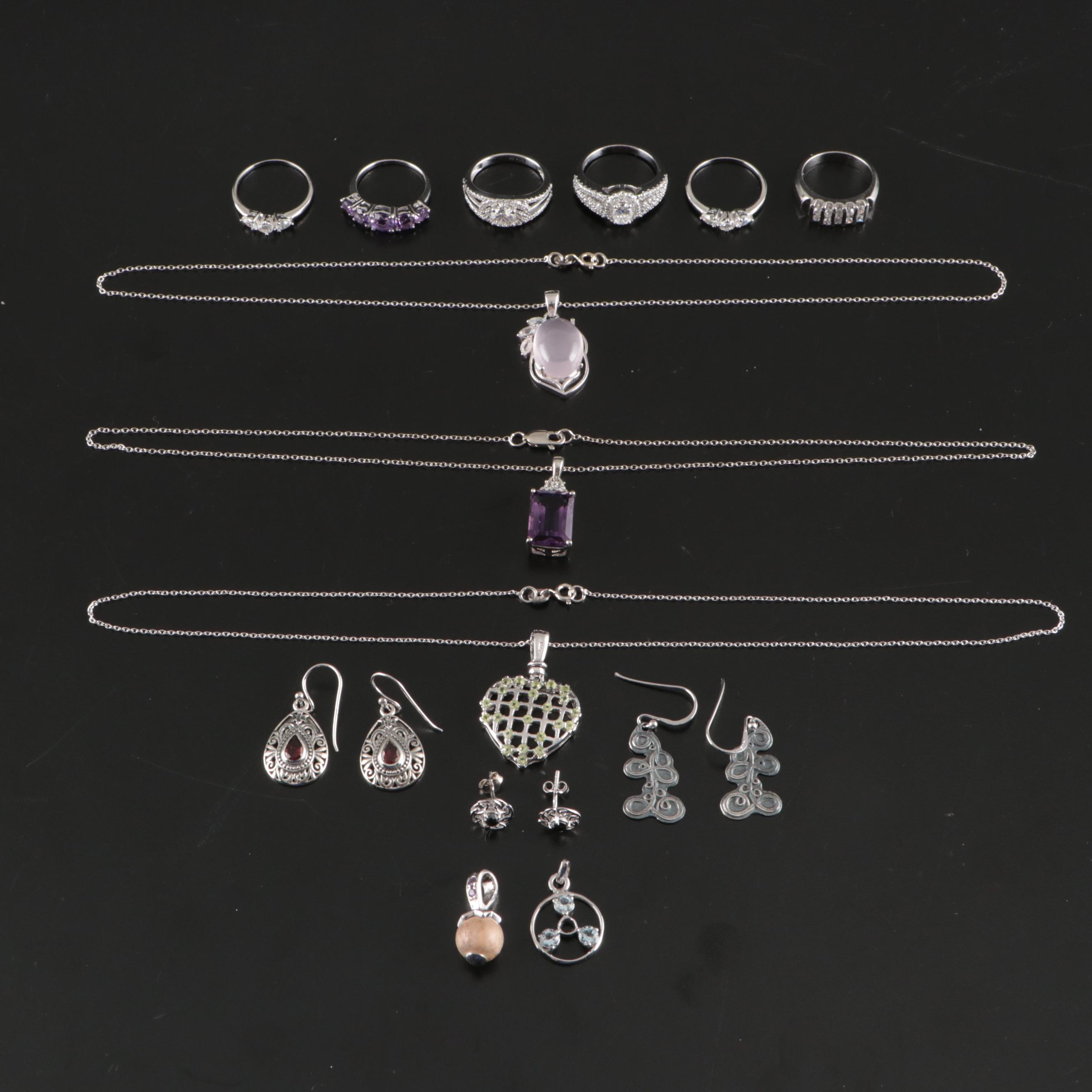 Group of 14 Assorted Sterling Silver Rings, Necklaces, Earrings, and Pendants