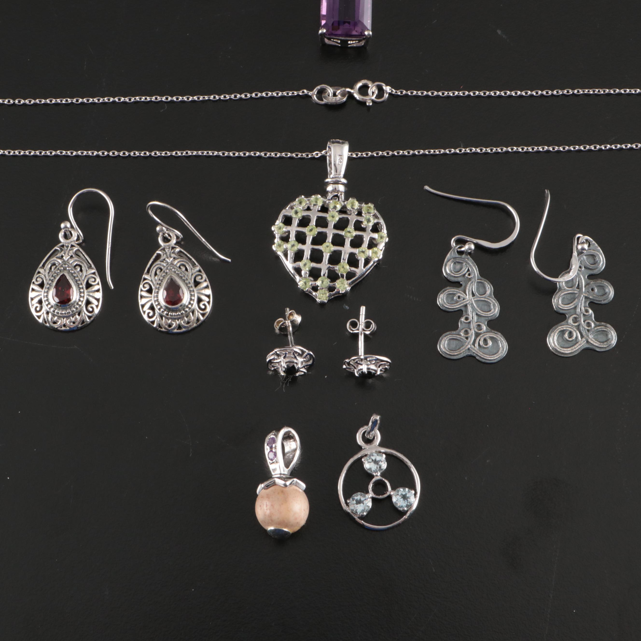 Group of 14 Assorted Sterling Silver Rings, Necklaces, Earrings, and Pendants