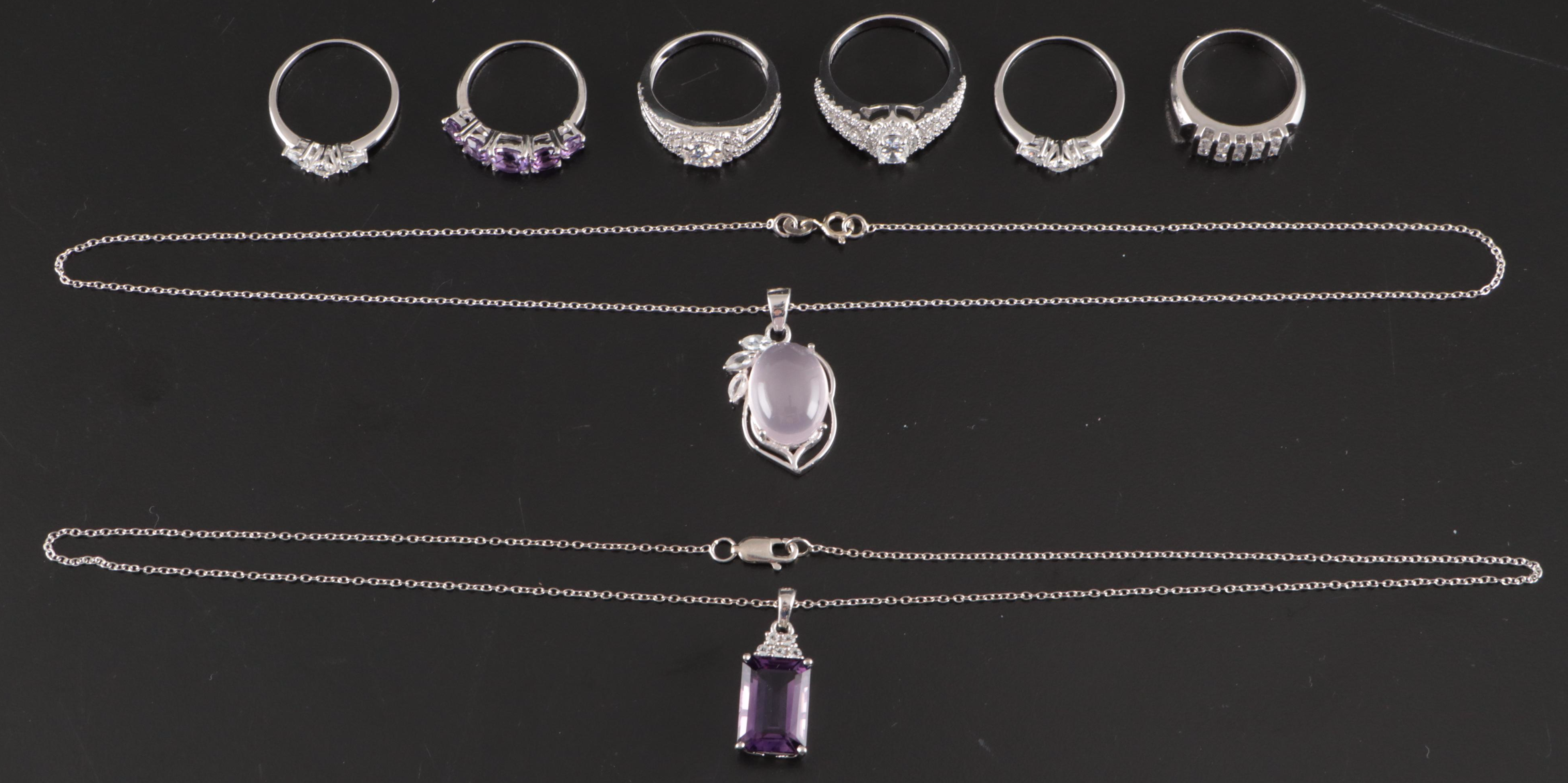 Group of 14 Assorted Sterling Silver Rings, Necklaces, Earrings, and Pendants