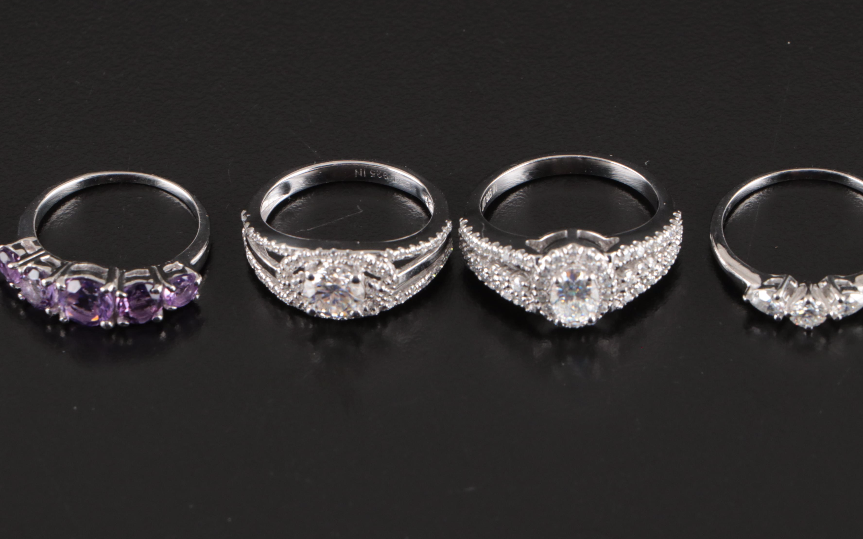 Group of 14 Assorted Sterling Silver Rings, Necklaces, Earrings, and Pendants