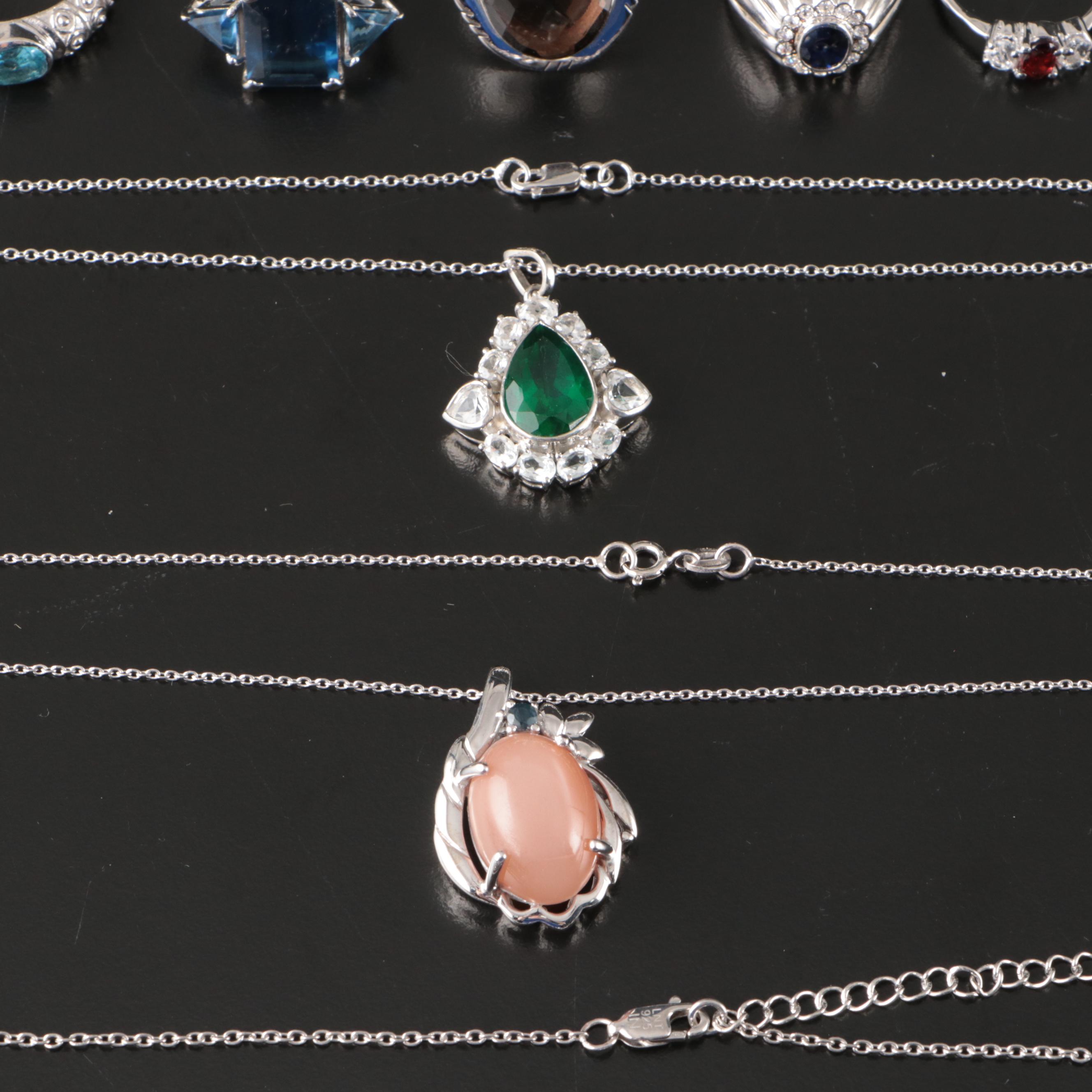 Group of 14 Assorted Sterling Silver Rings, Necklaces, Earrings, and Pendants