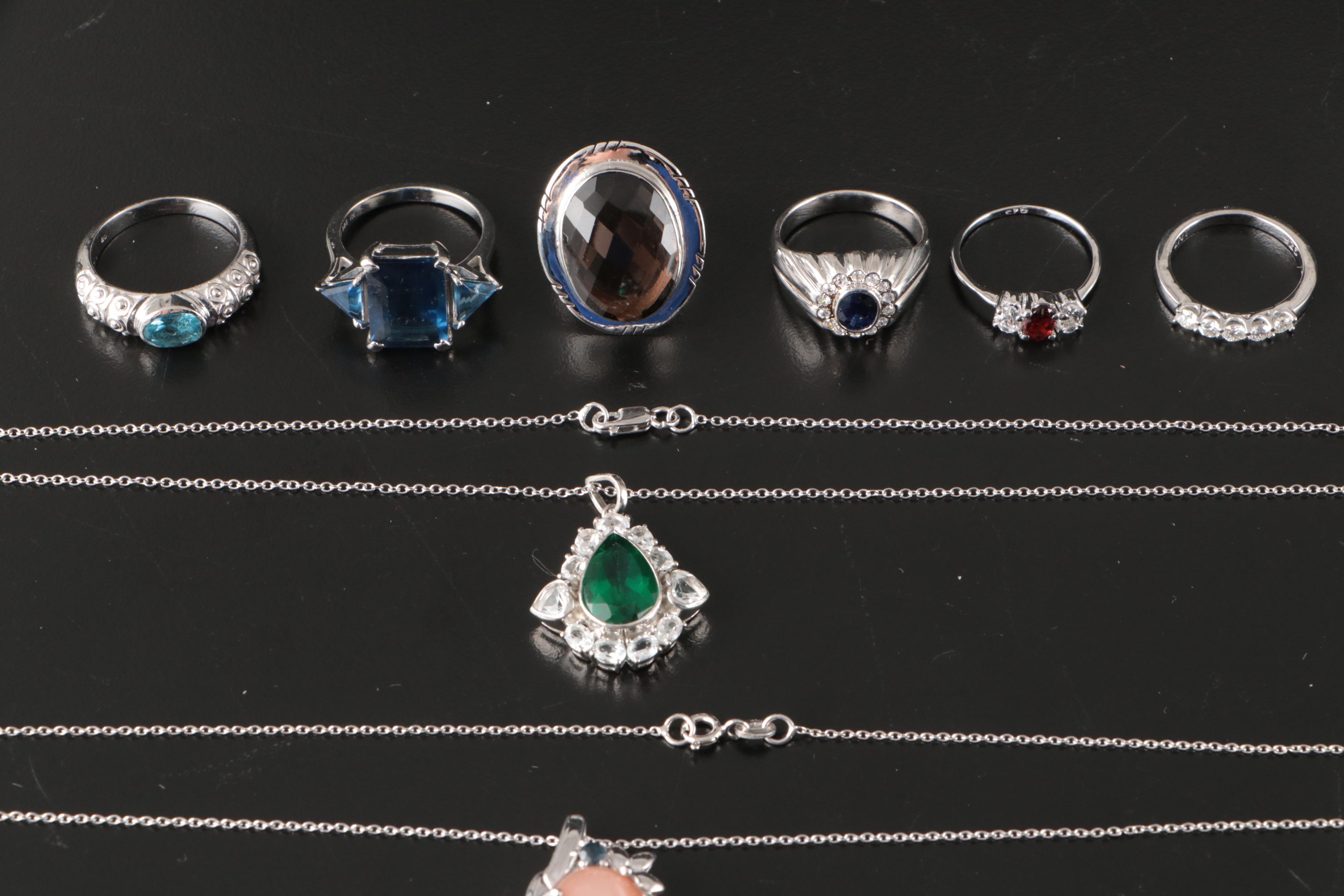 Group of 14 Assorted Sterling Silver Rings, Necklaces, Earrings, and Pendants